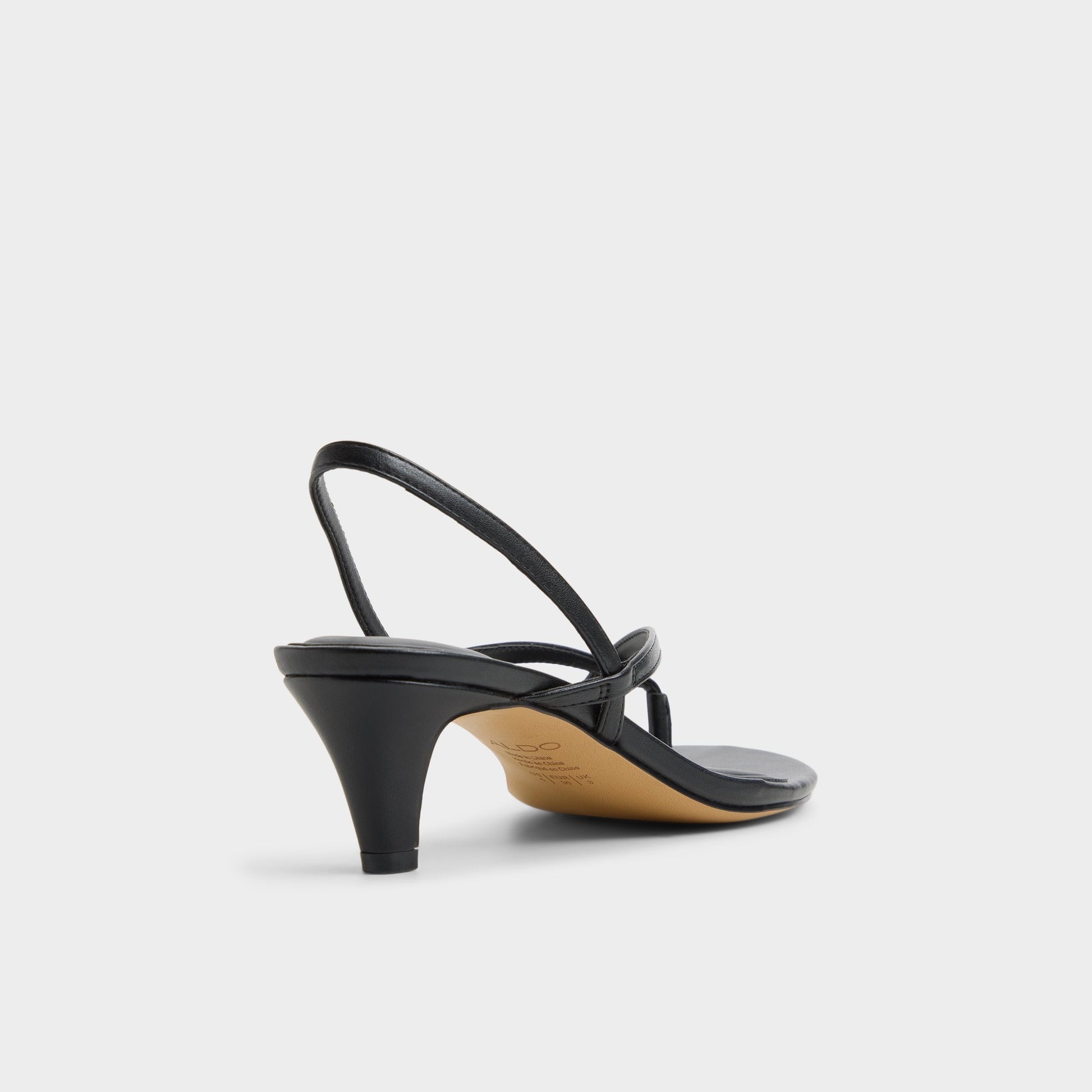 Three-quarter angle of Black Lioria Slingback kitten heel sandal's back side