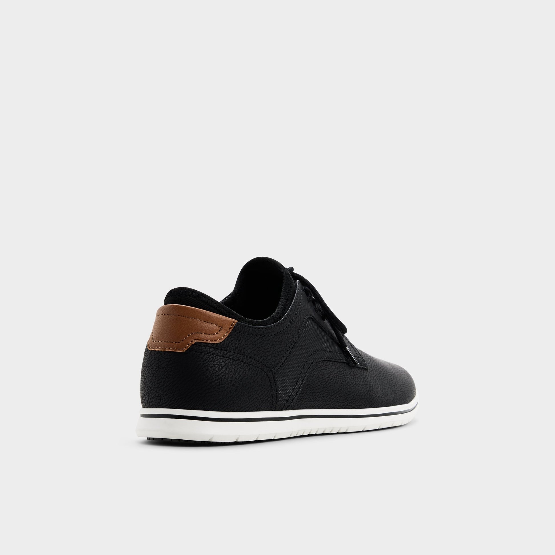 Three-quarter angle of Open black Drymos Oxford shoe's back side