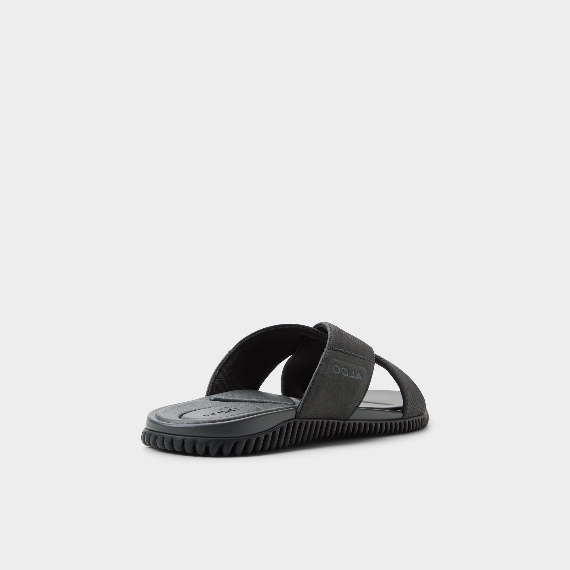 Three-quarter angle of Black Valmar Slide sandal's back side