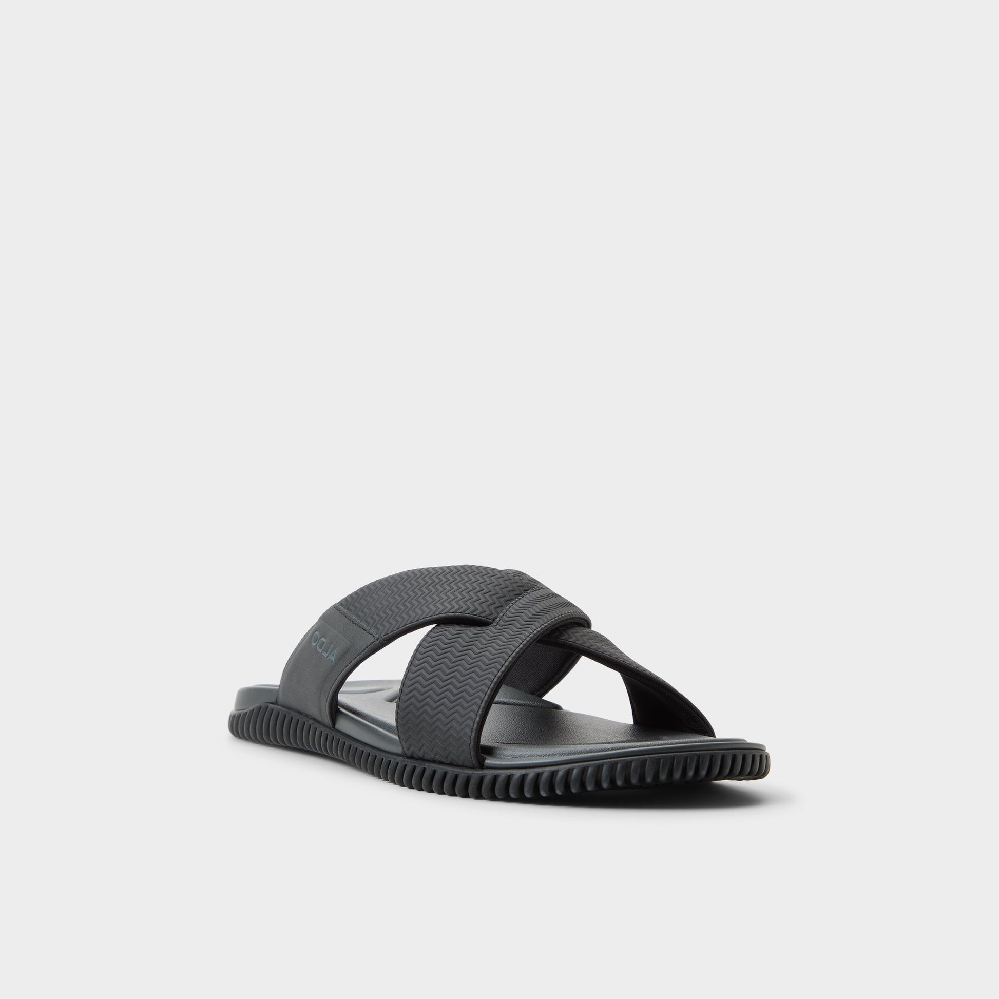 Three-quarter angle of Black Valmar Slide sandal's front side