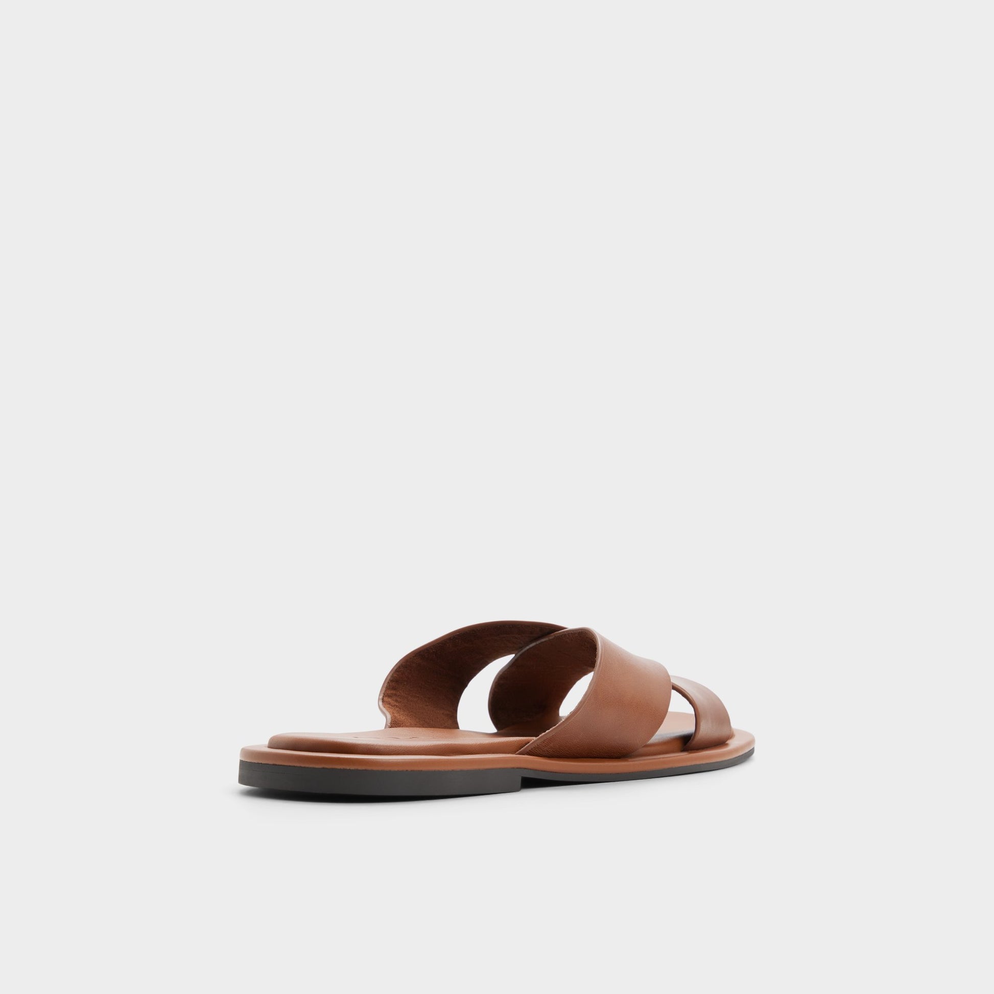 Three-quarter angle of Cognac Emris Slide sandal's back side