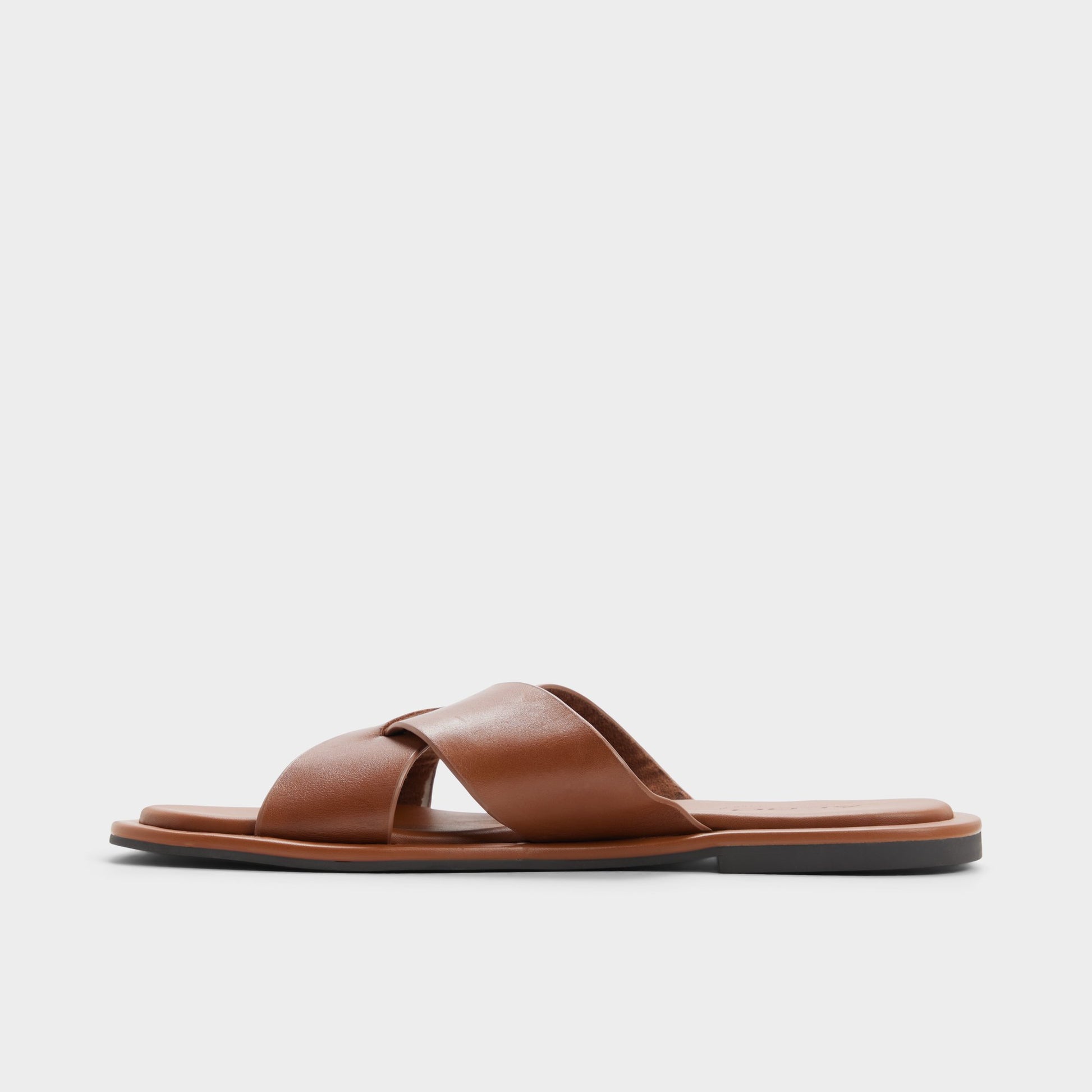 Side view of Cognac Emris Slide sandal