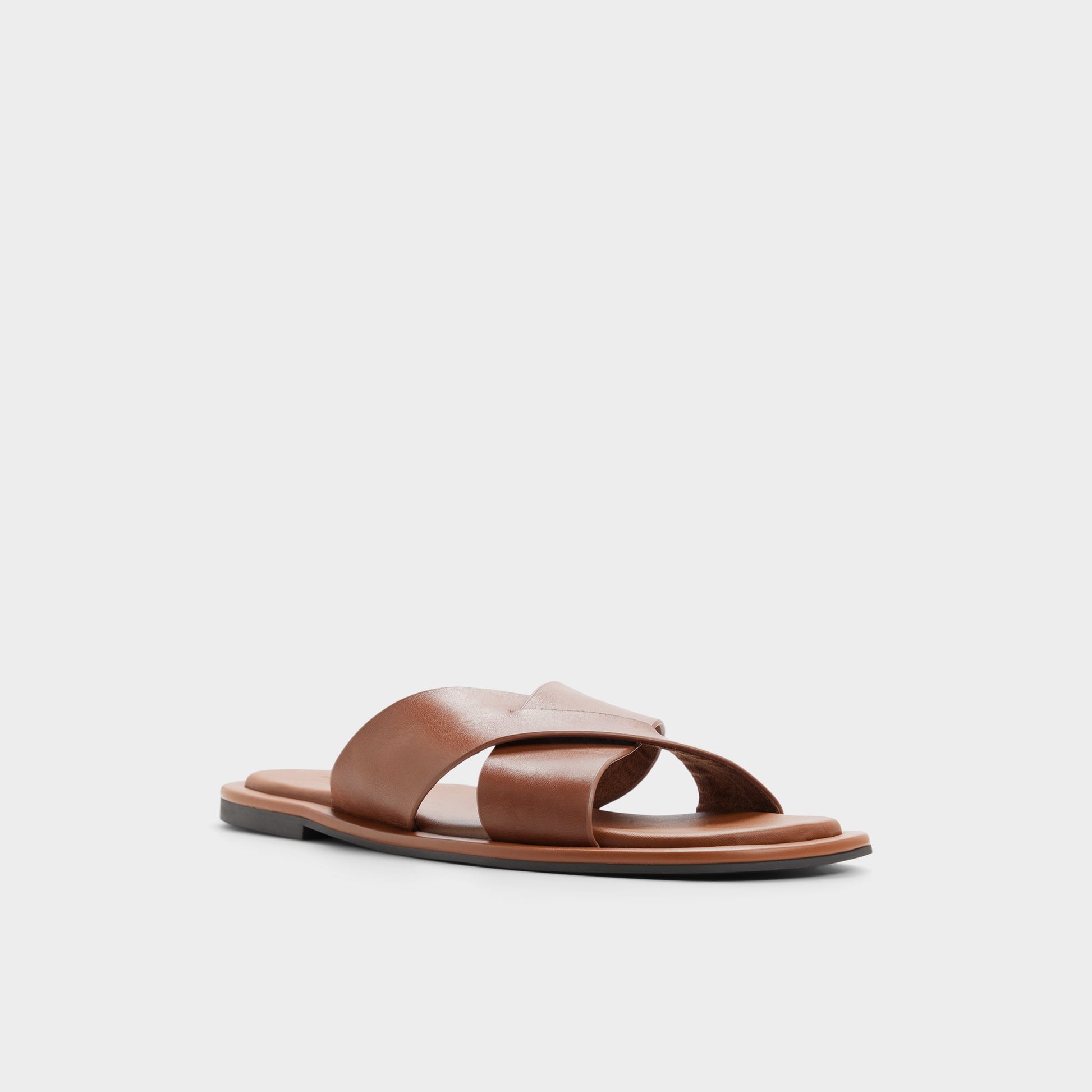 Three-quarter angle of Cognac Emris Slide sandal's front side