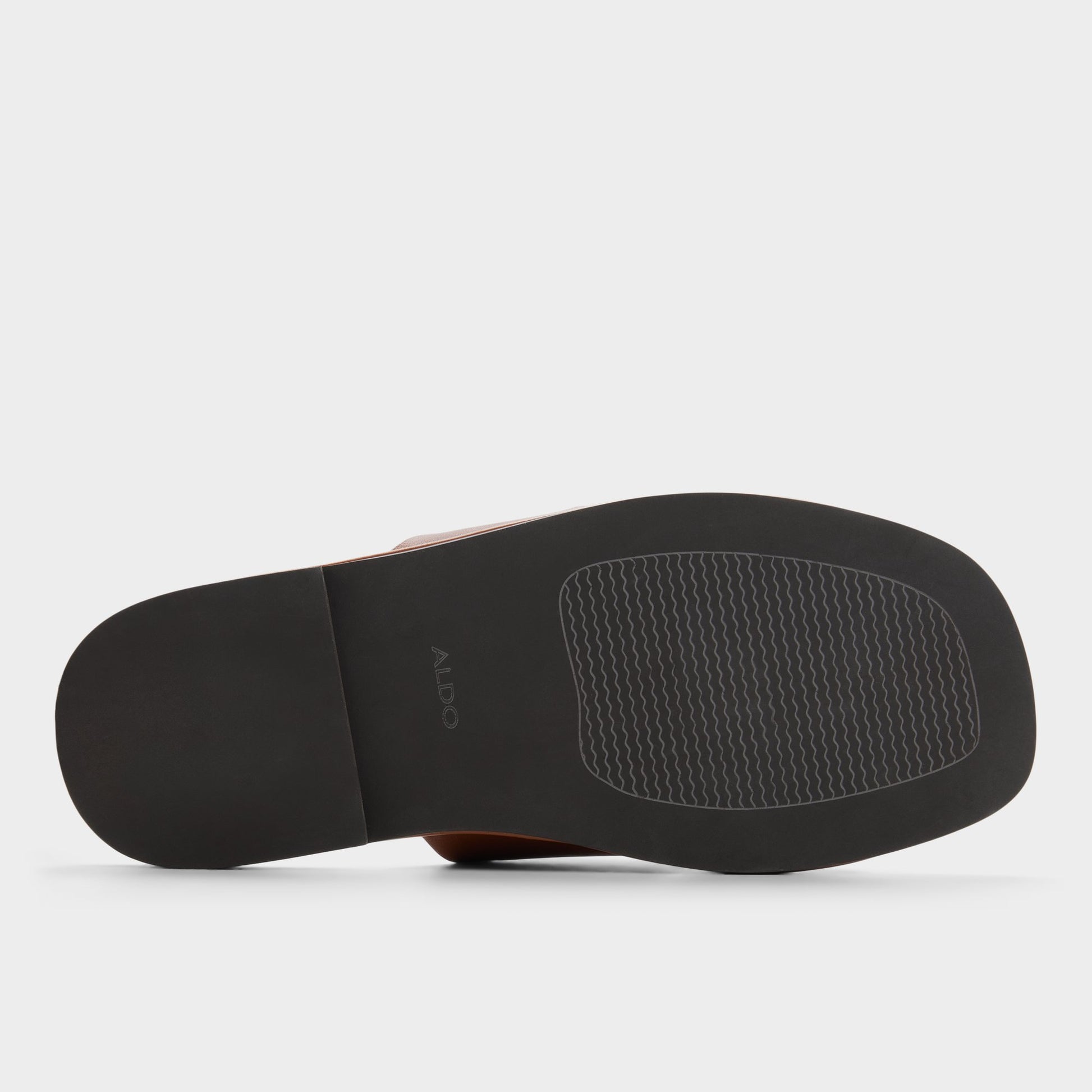 View of Cognac Emris Slide sandal's sole