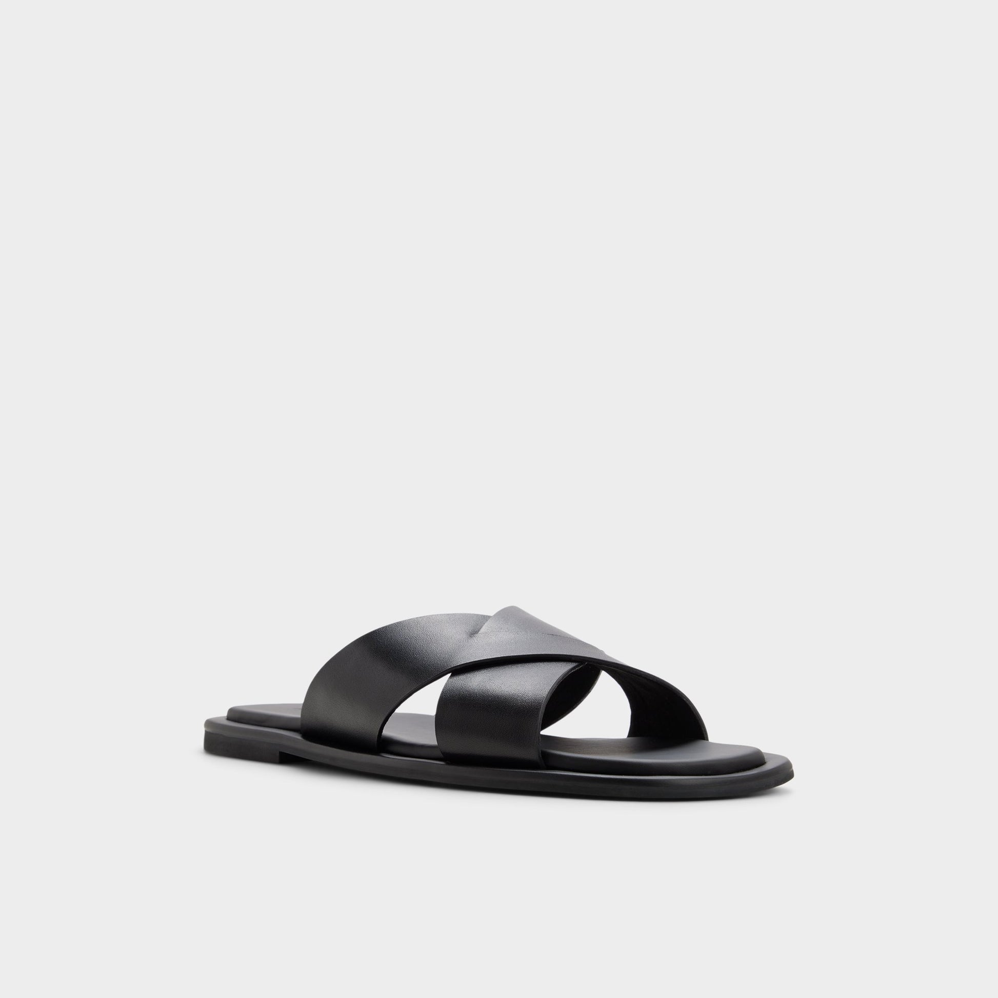 Three-quarter angle of Black/black Emris Slide sandal's front side