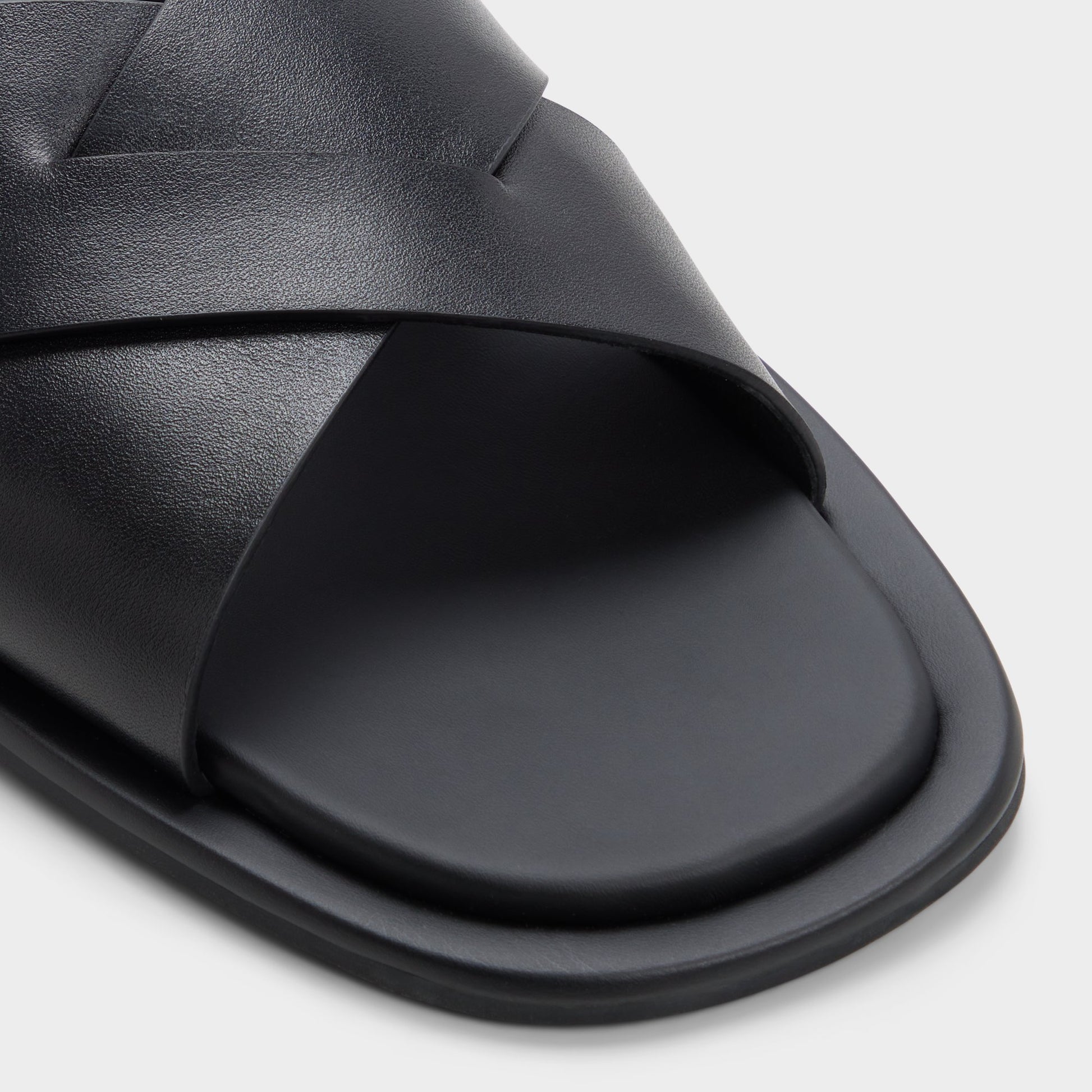 Close-up of the Black/black Emris Slide sandal