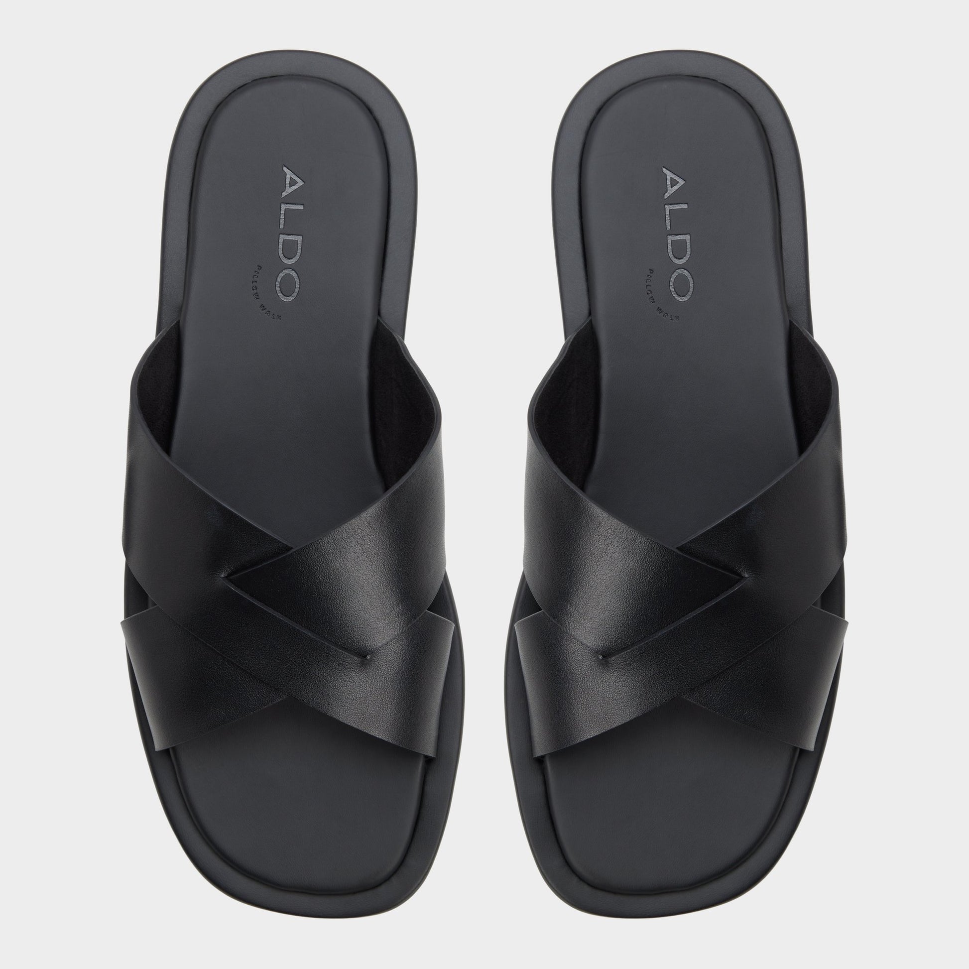 Top-down view of the Black/black Emris Slide sandal