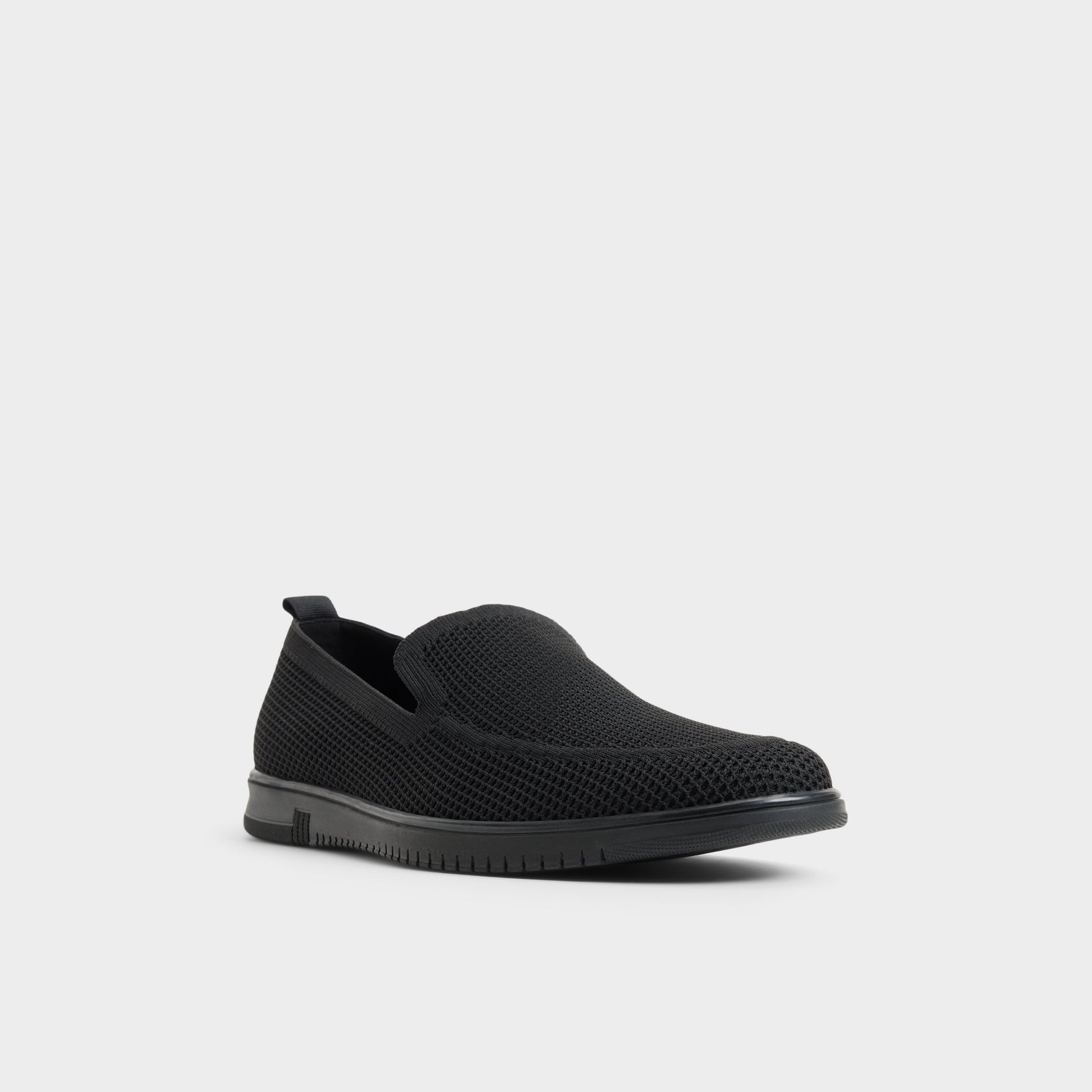 Three-quarter angle of Black Luxton Slip-on's front side