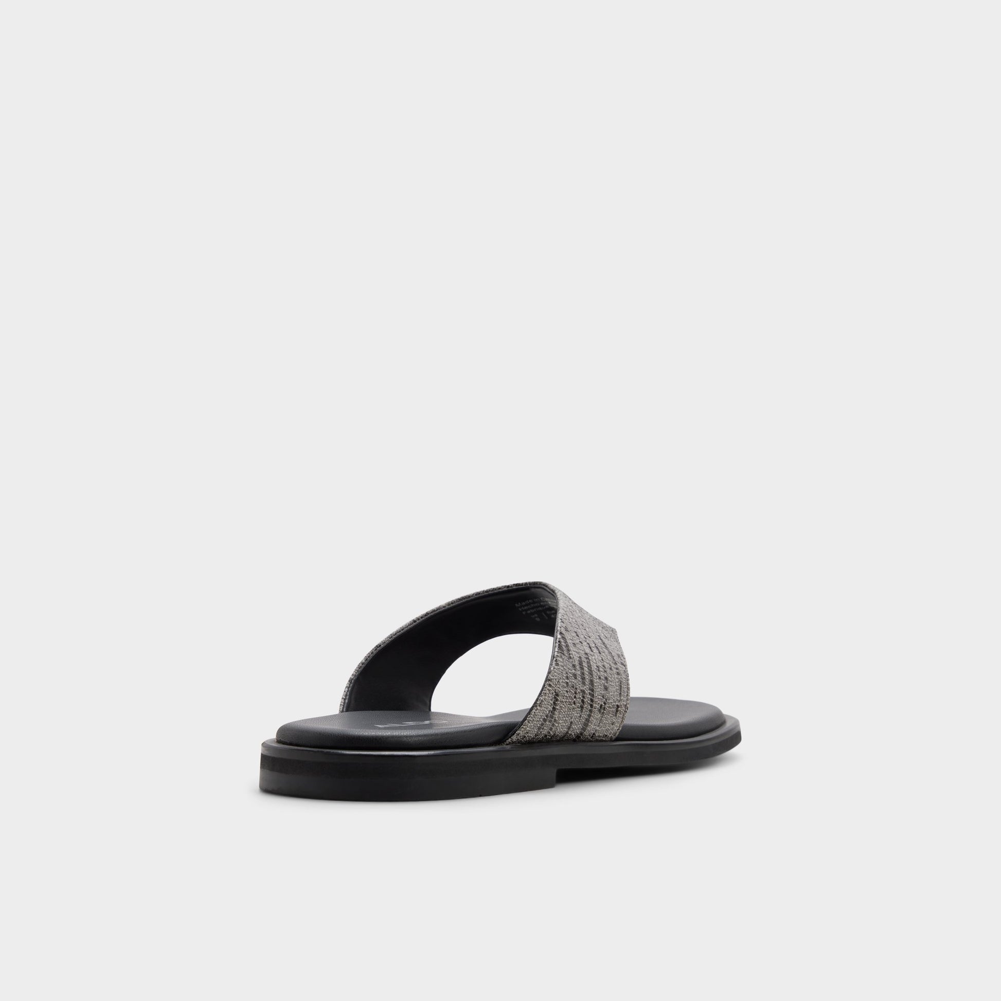 Three-quarter angle of Dark grey Smolder Flip flop's back side