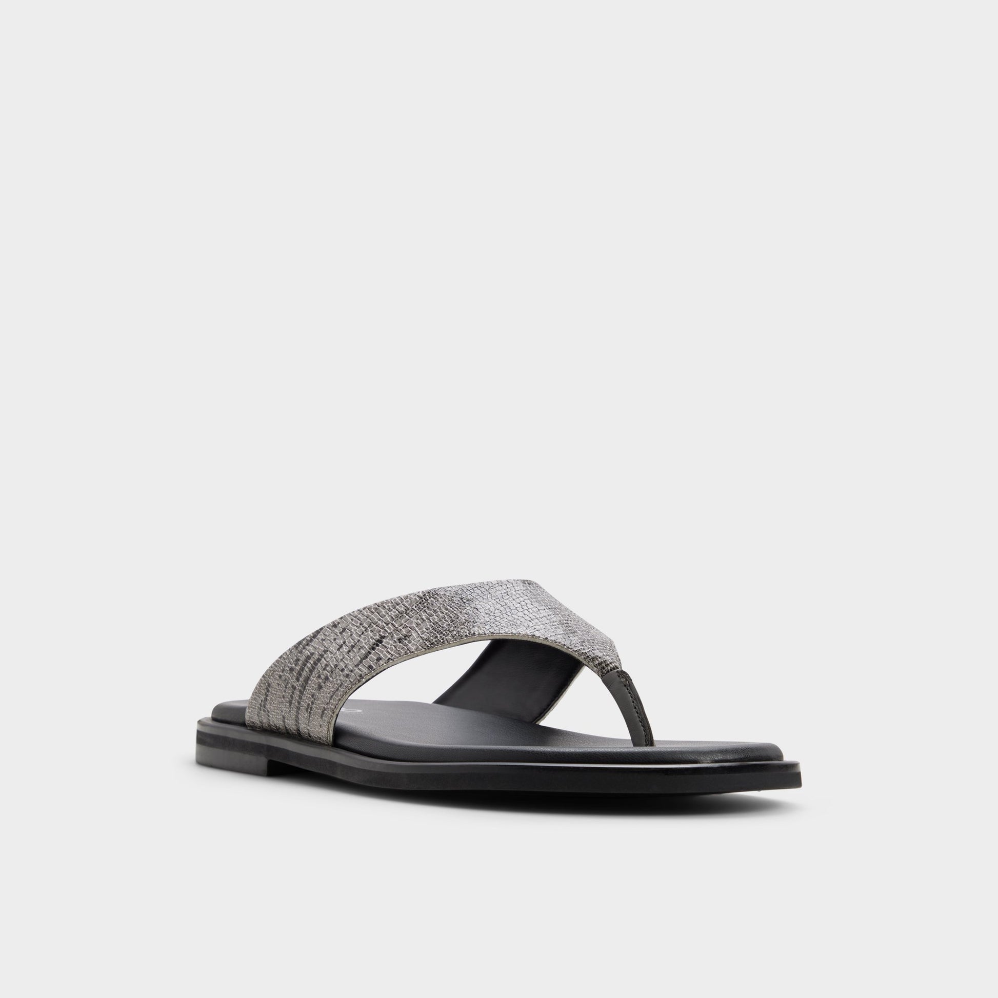 Three-quarter angle of Dark grey Smolder Flip flop's front side