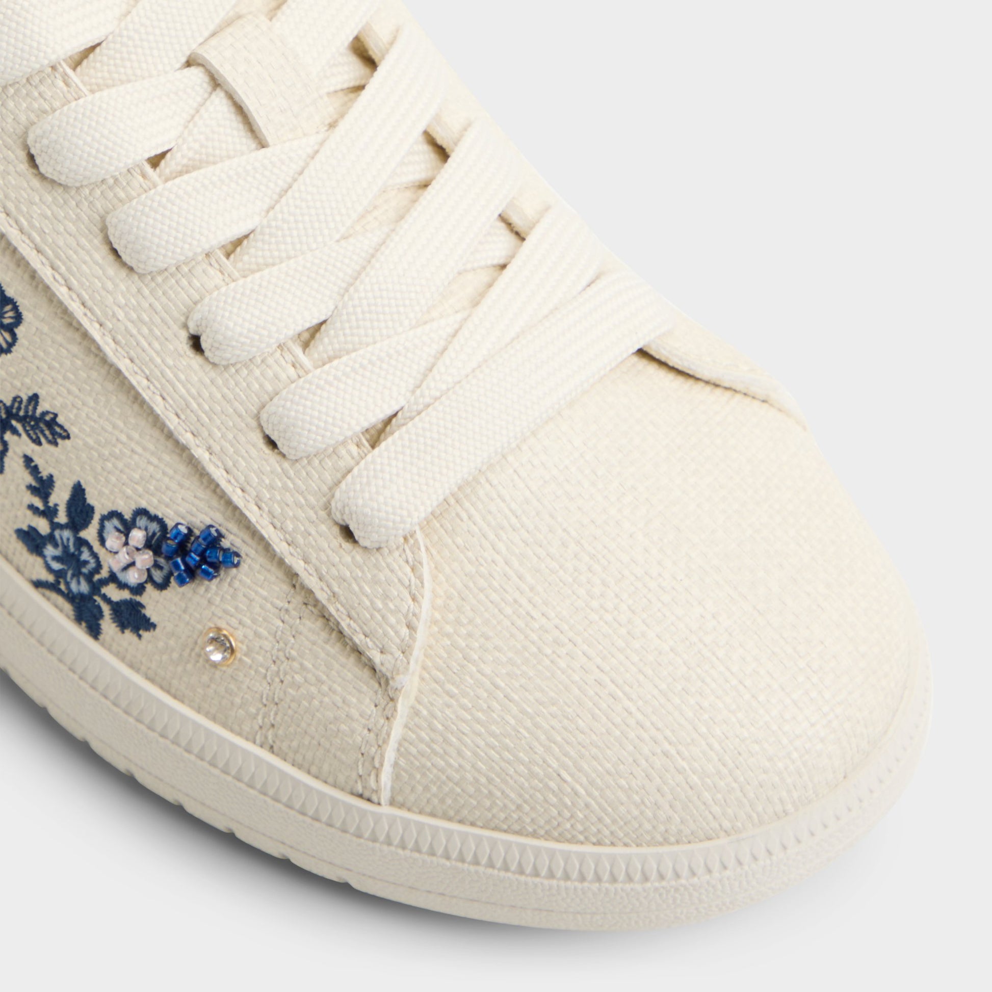Close-up of the White/blue Palmtree Sneaker