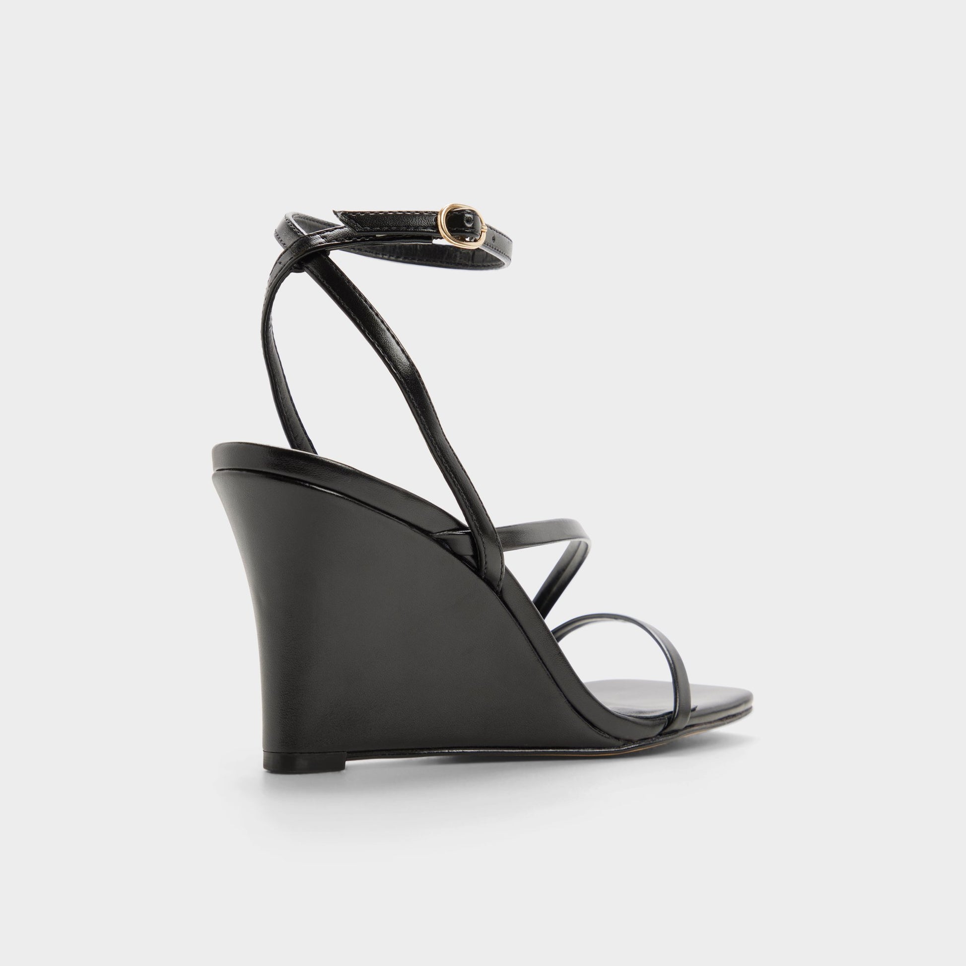 Three-quarter angle of Black Lineria Strappy wedge sandal's back side
