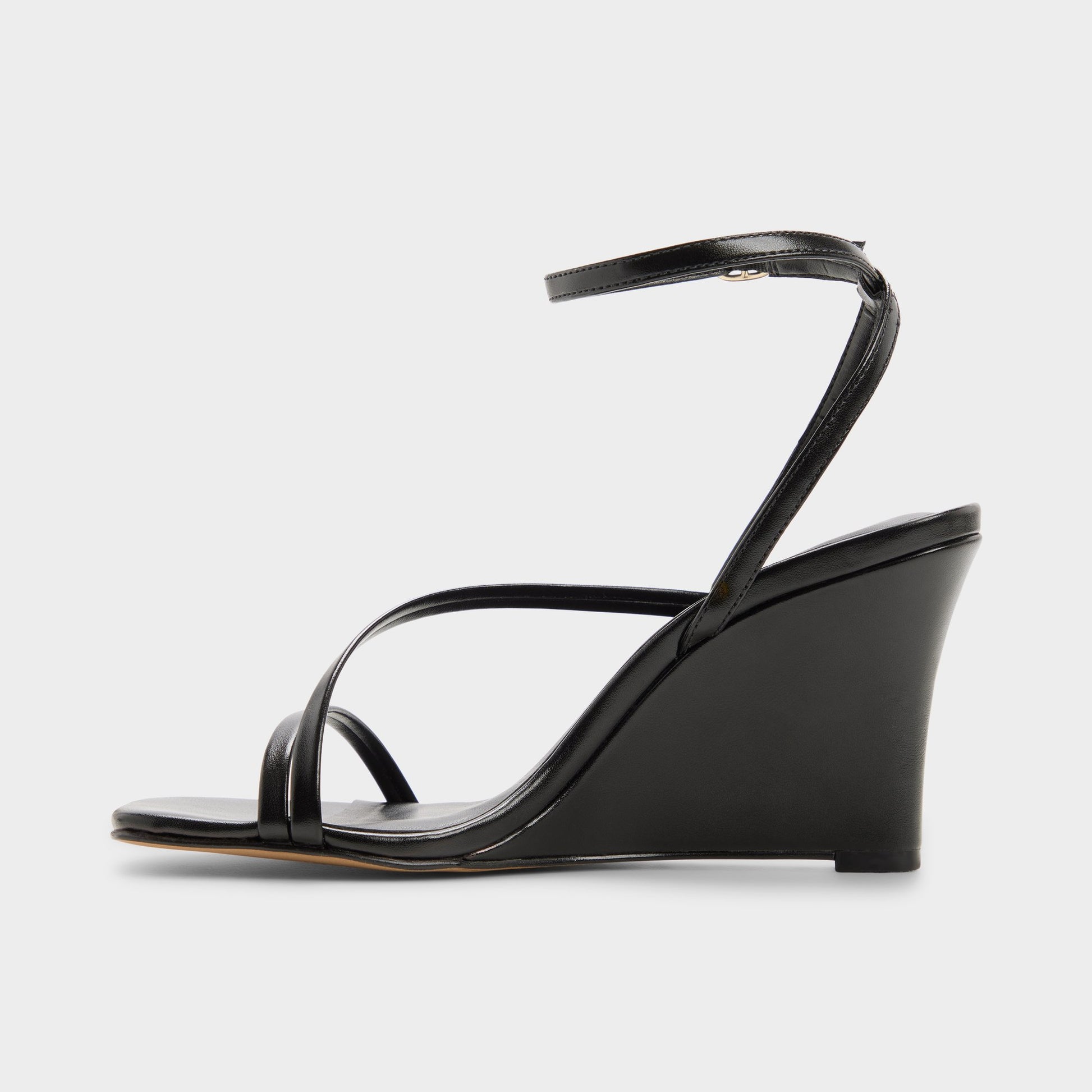 Side view of Black Lineria Strappy wedge sandal