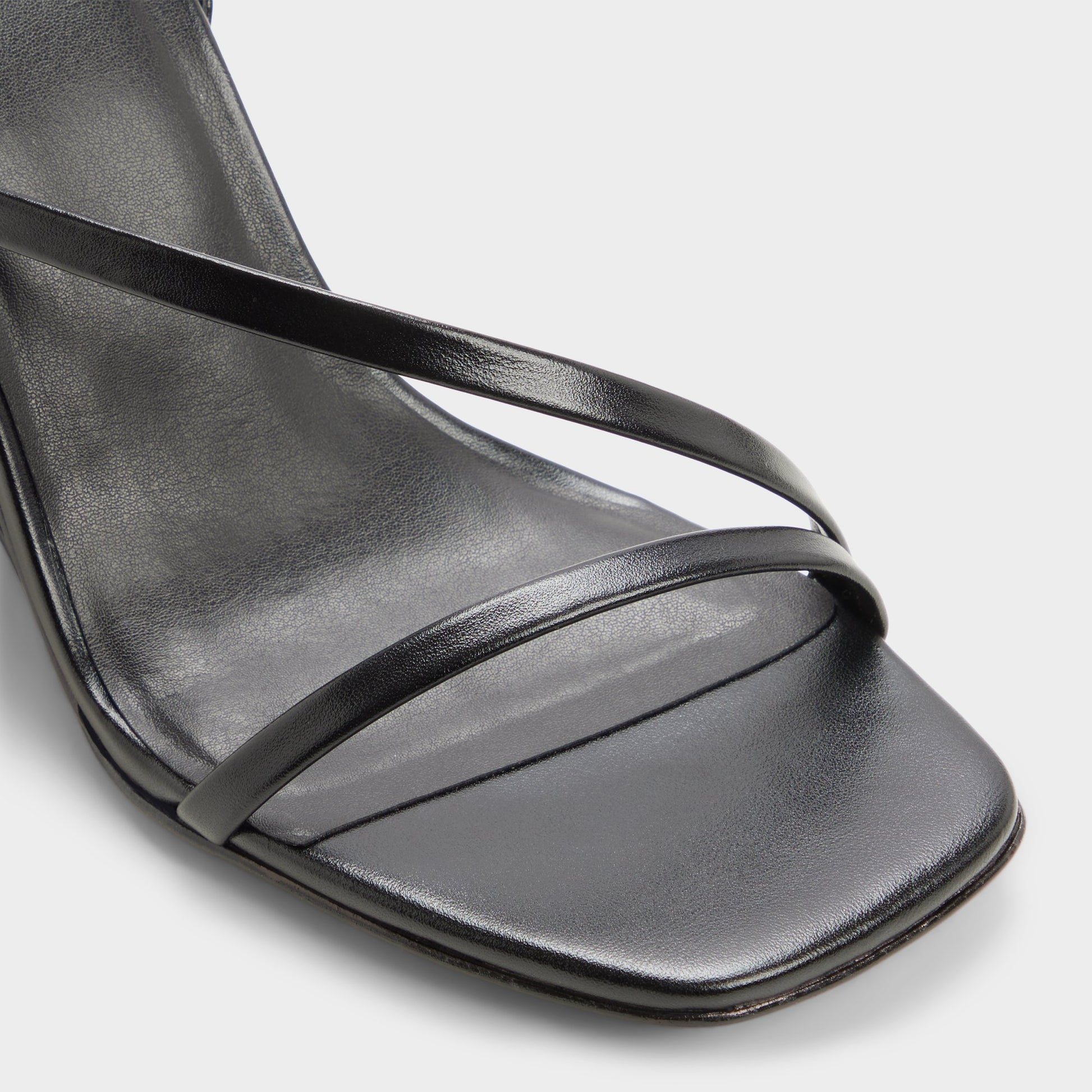 Close-up of the Black Lineria Strappy wedge sandal