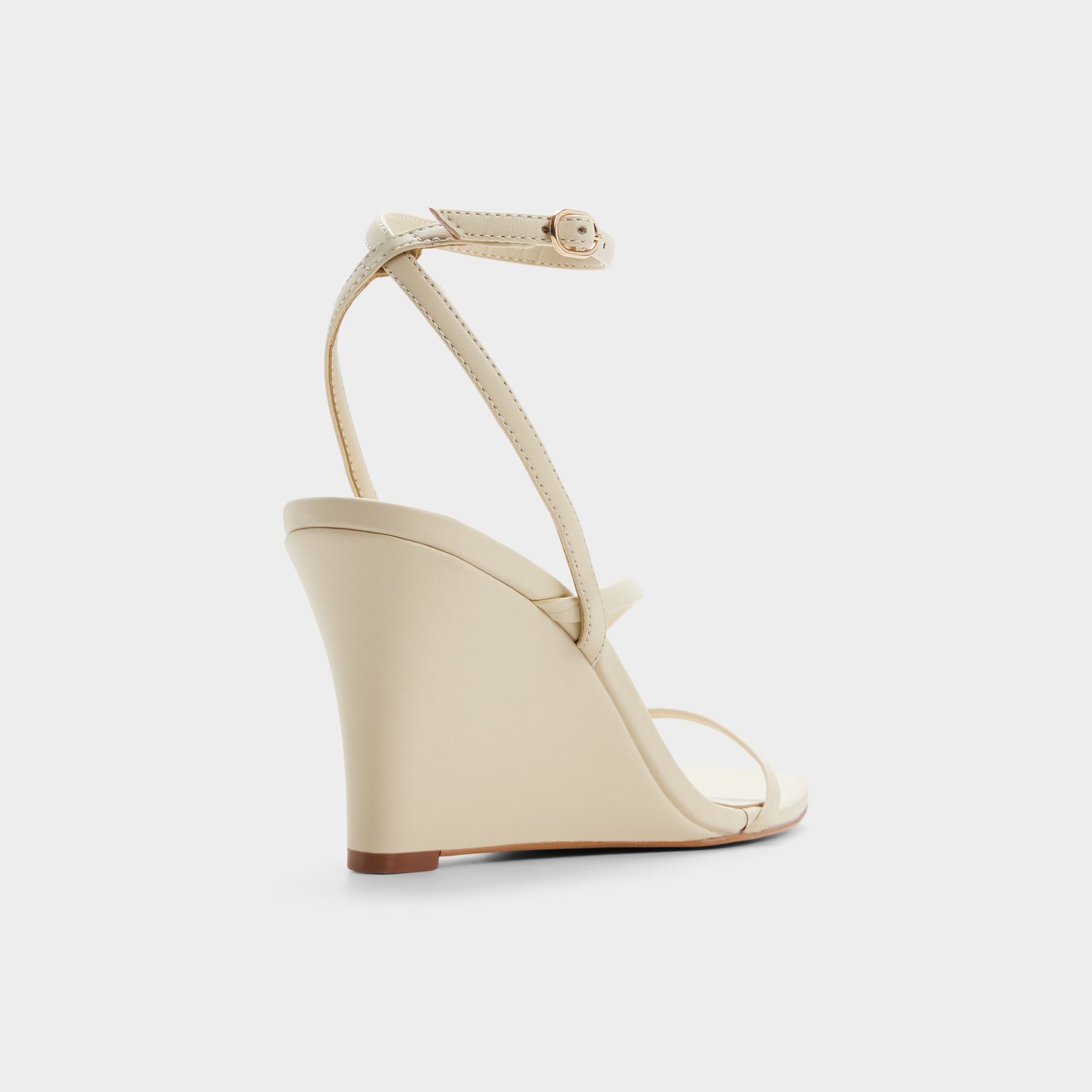 Three-quarter angle of Cream Lineria Strappy wedge sandal's back side
