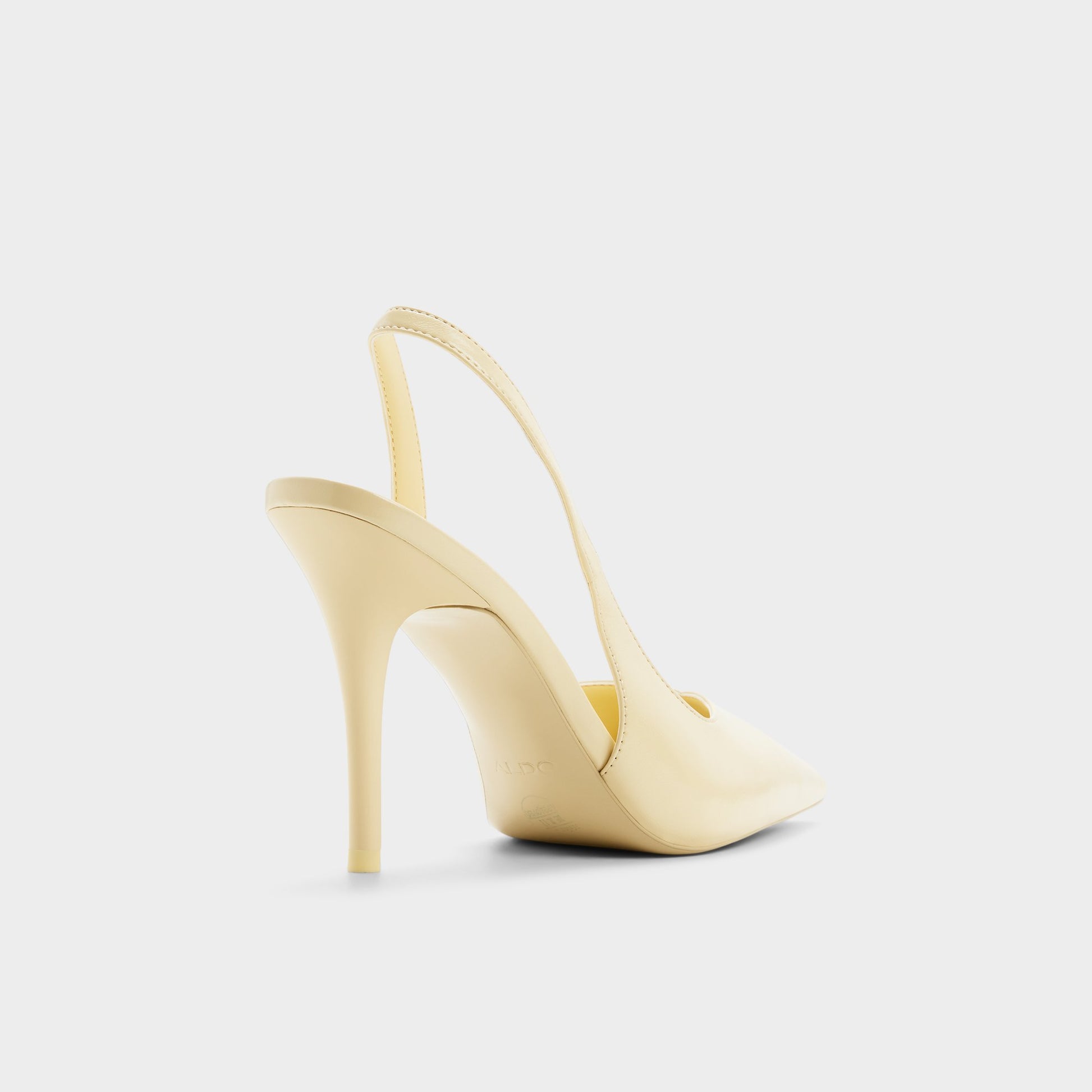 Three-quarter angle of Light yellow Amilie Slingback high heel's back side
