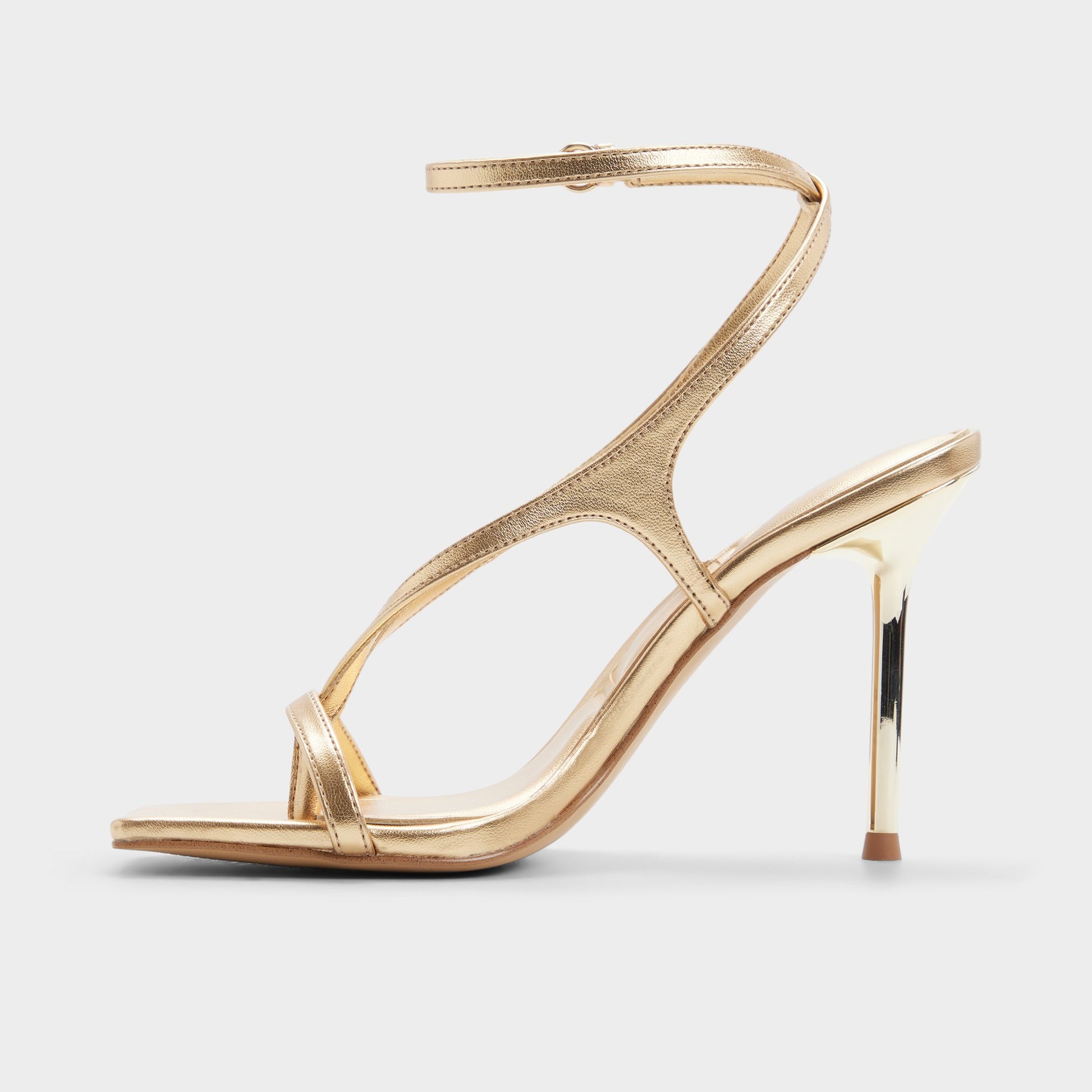 Side view of Gold Sparks Strappy heeled sandal