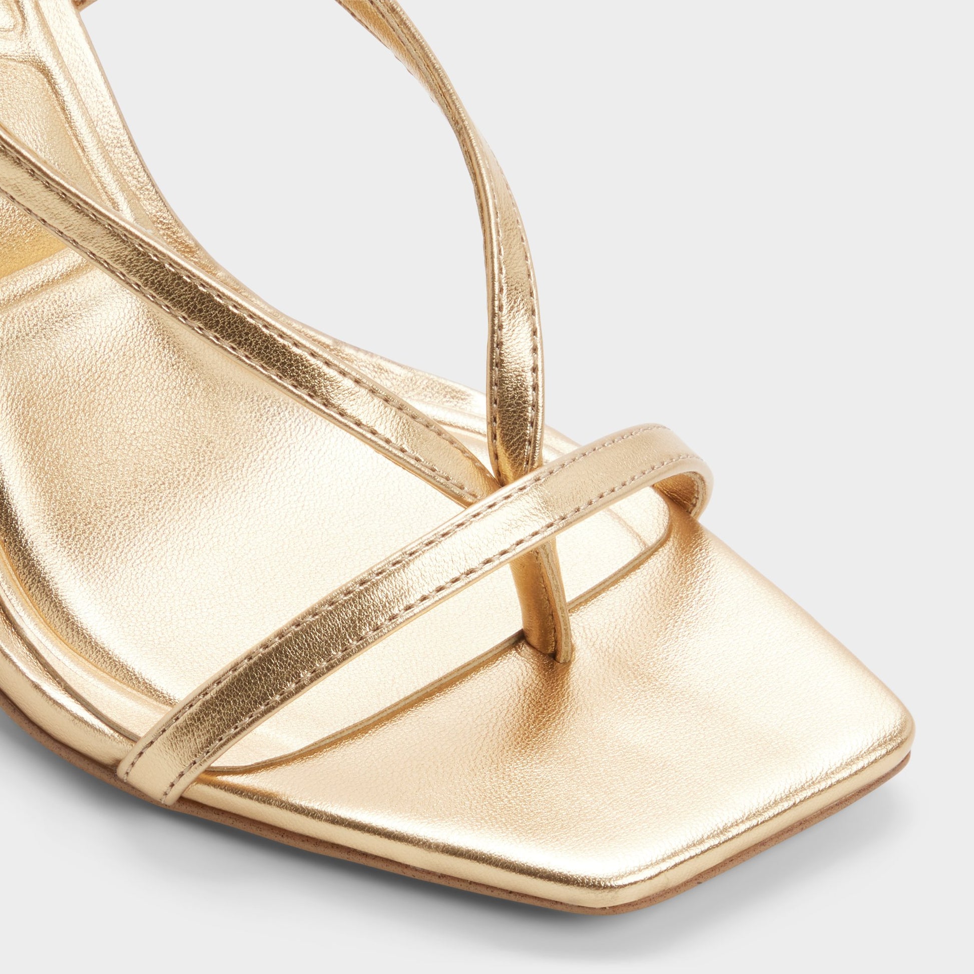 Close-up of the Gold Sparks Strappy heeled sandal