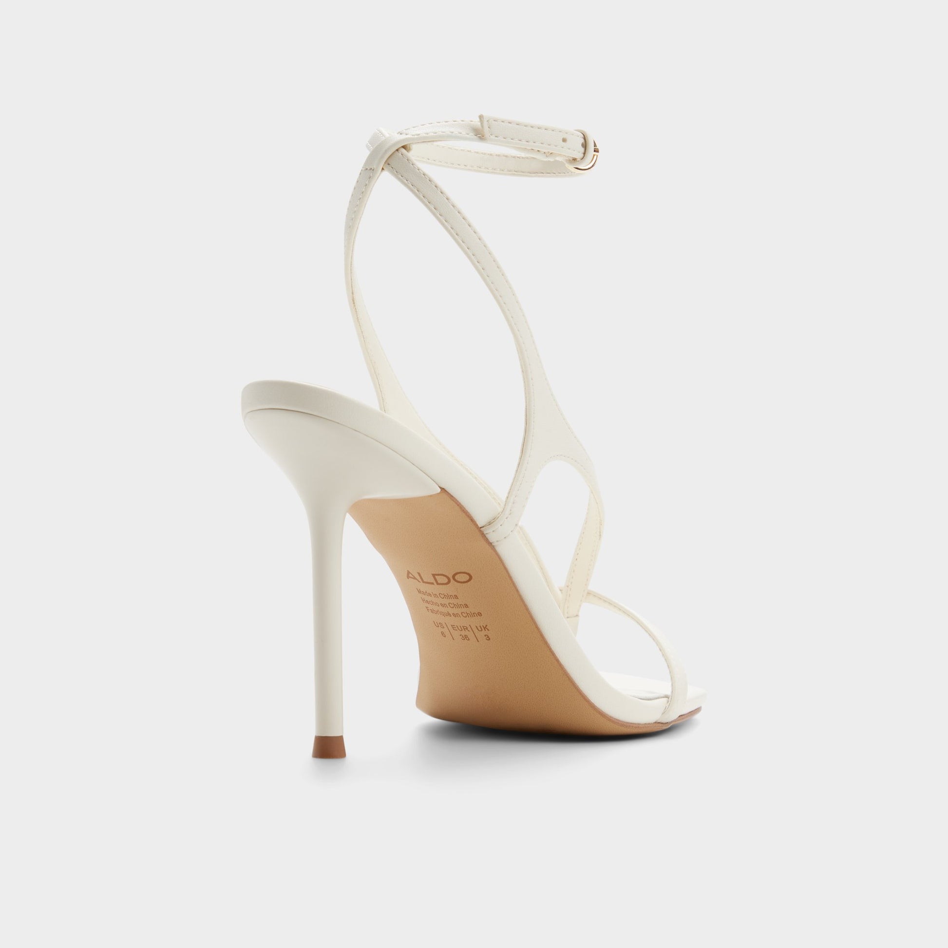 Three-quarter angle of Other white Sparks Strappy heeled sandal's back side