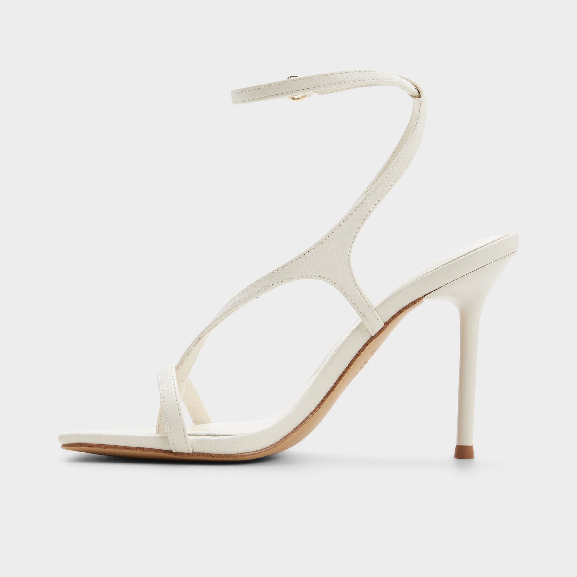 Side view of Other white Sparks Strappy heeled sandal