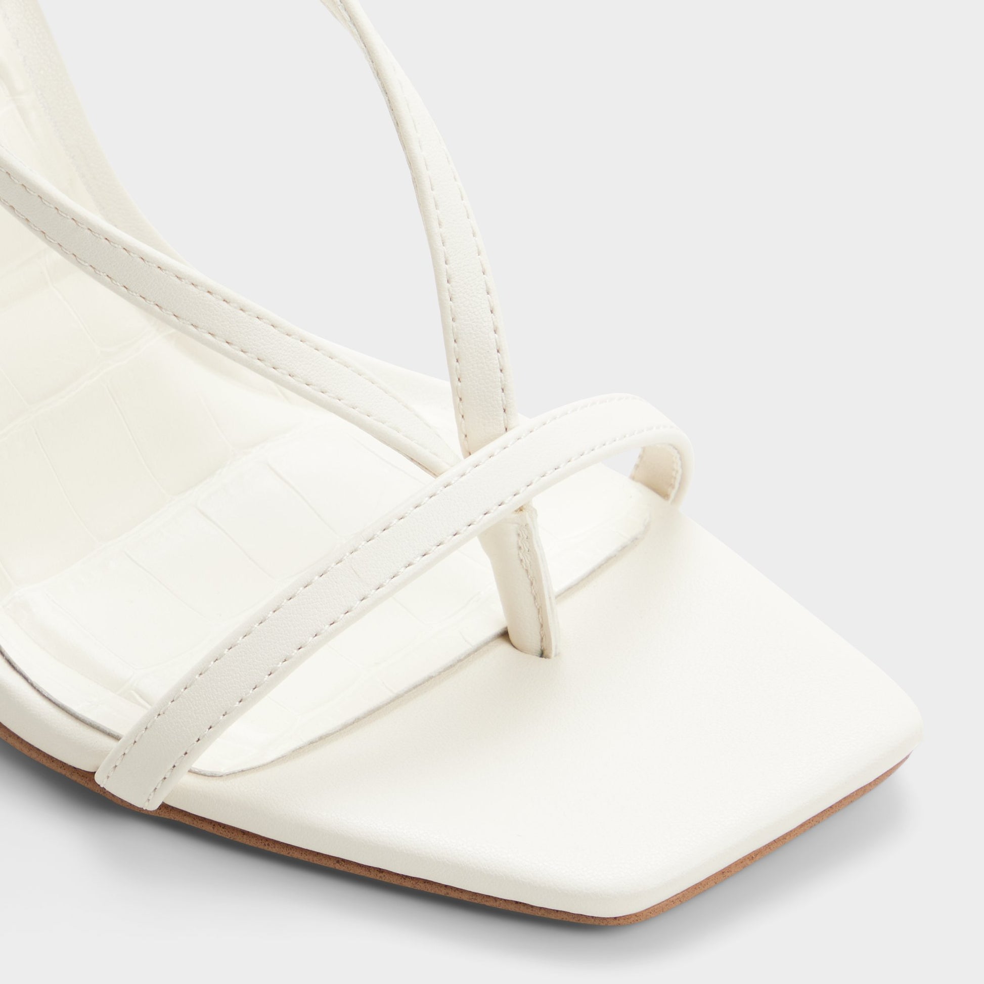 Close-up of the Other white Sparks Strappy heeled sandal