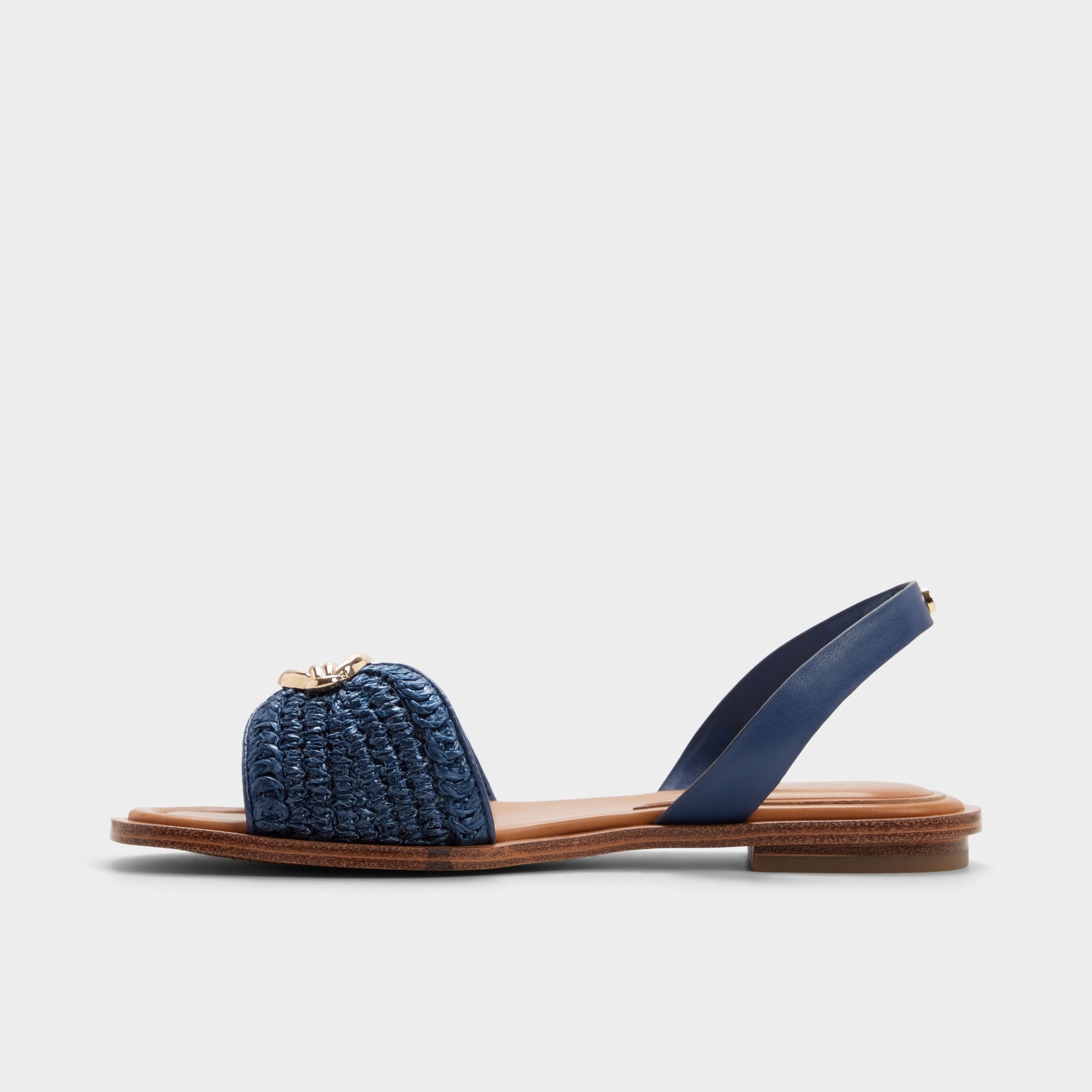Side view of Navy Calelian Flat sandal