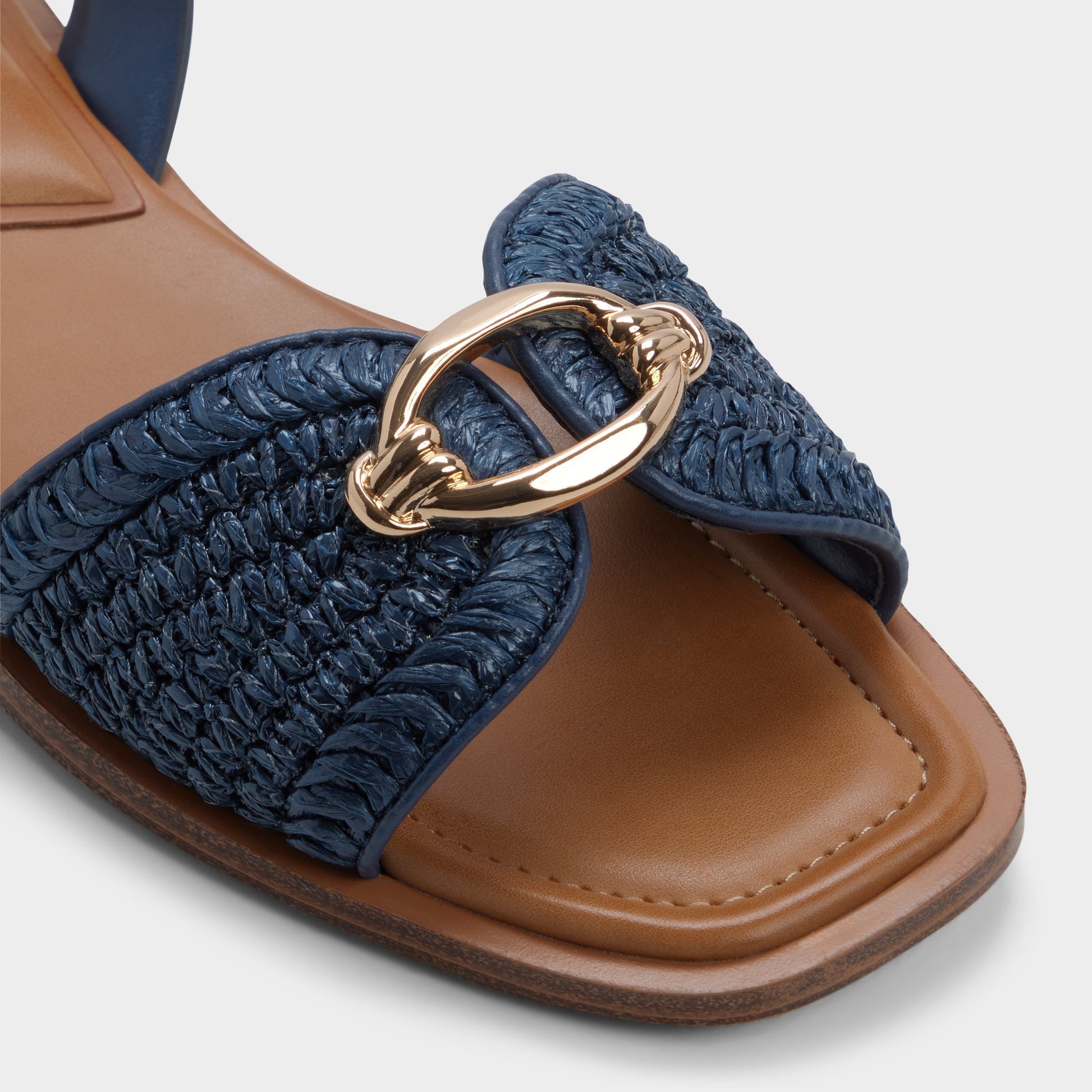 Close-up of the Navy Calelian Flat sandal