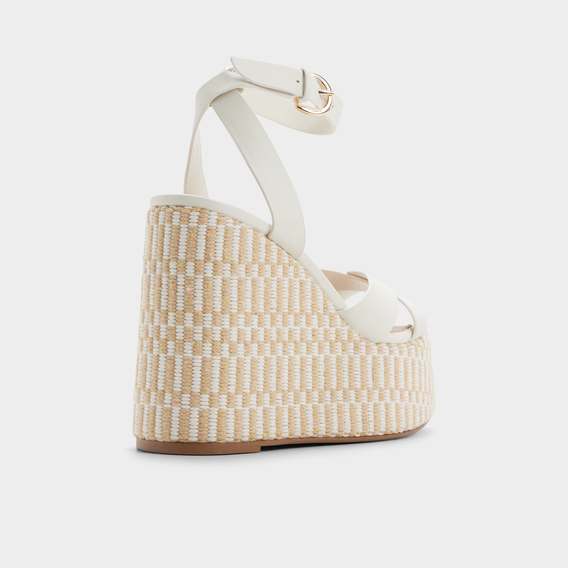 Three-quarter angle of White/bone Gabriana Wedge sandal's back side