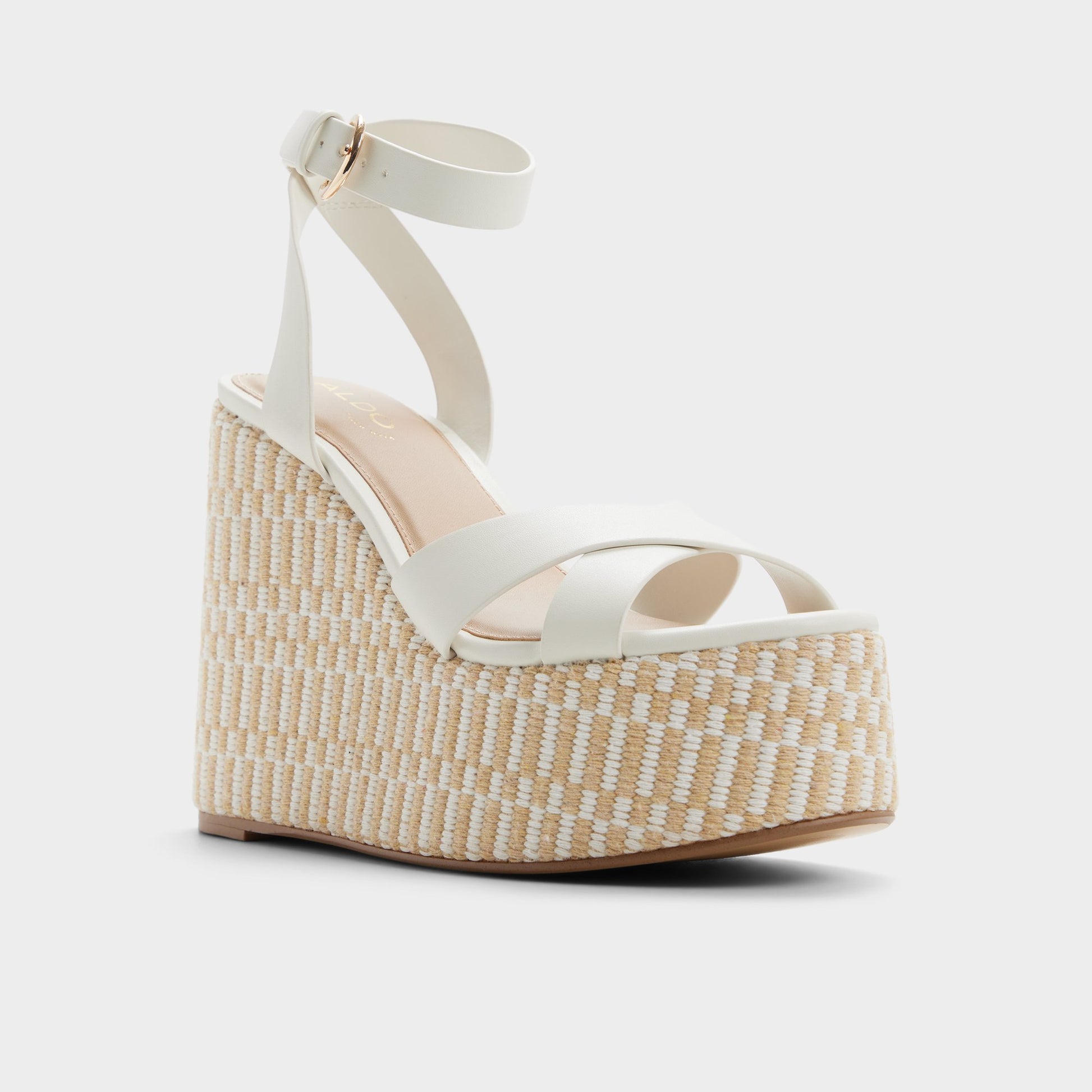 Three-quarter angle of White/bone Gabriana Wedge sandal's front side
