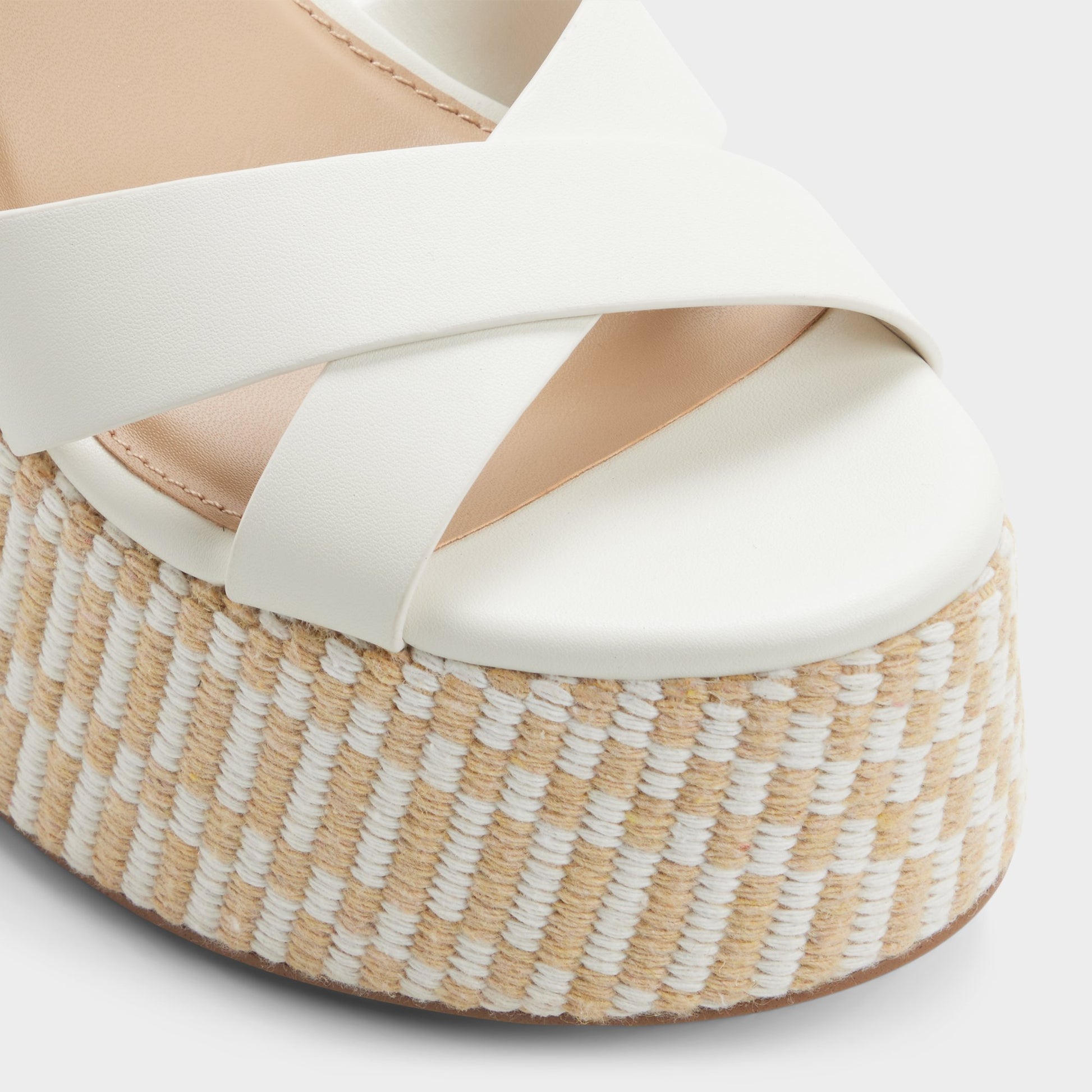 Close-up of the White/bone Gabriana Wedge sandal