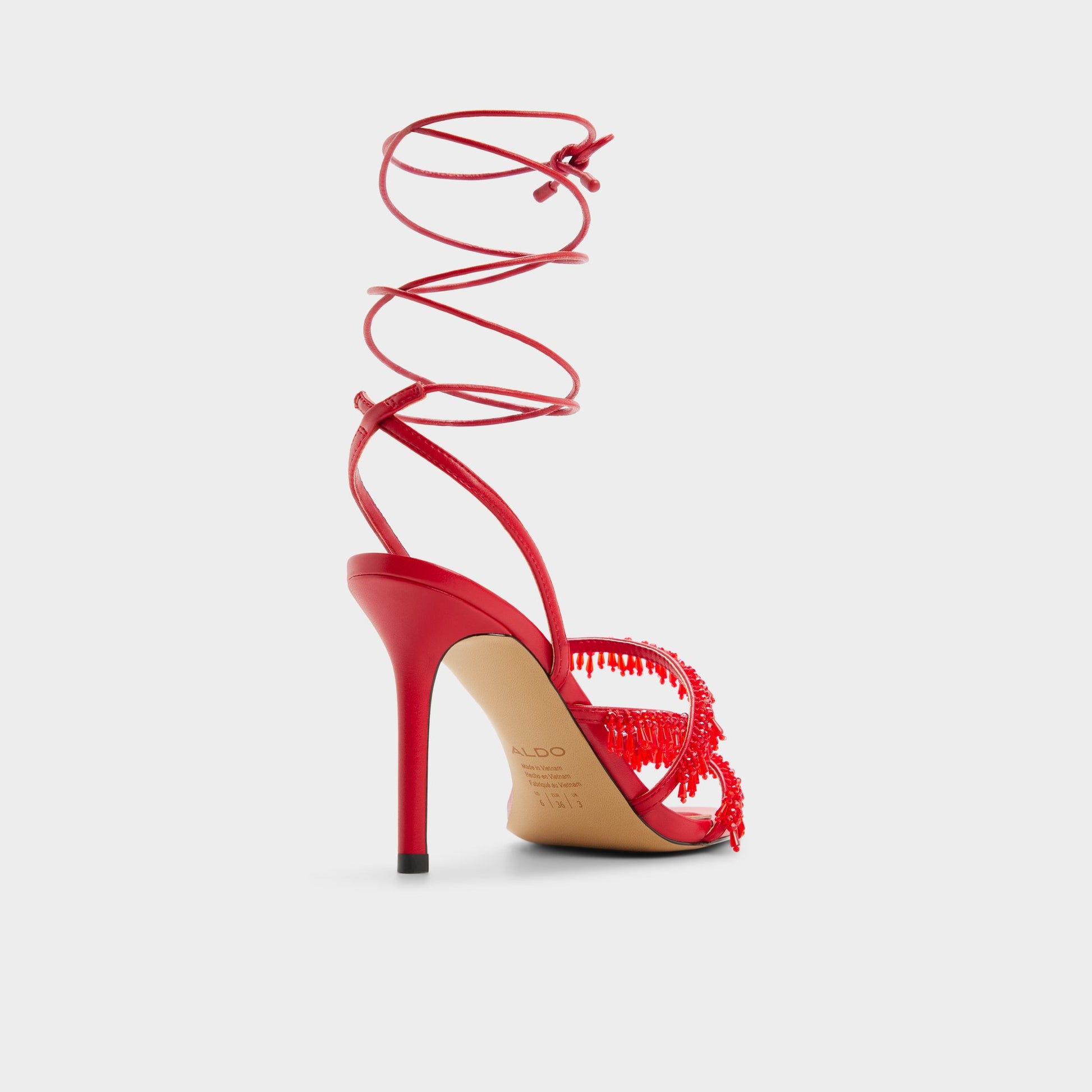 Three-quarter angle of Bright red Flaming Strappy heeled sandal's back side