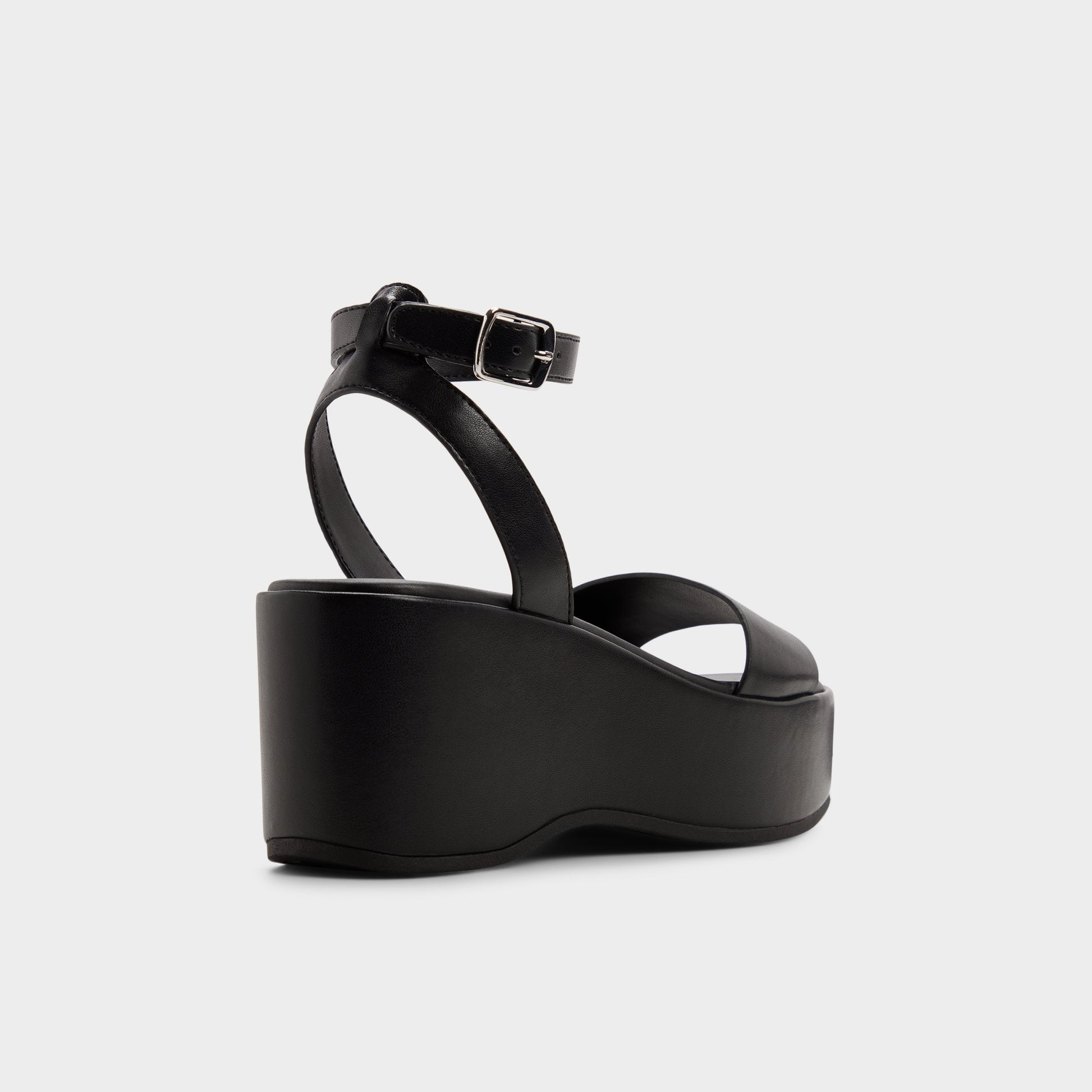 Three-quarter angle of Black Oneiwin Wedge sandal's back side