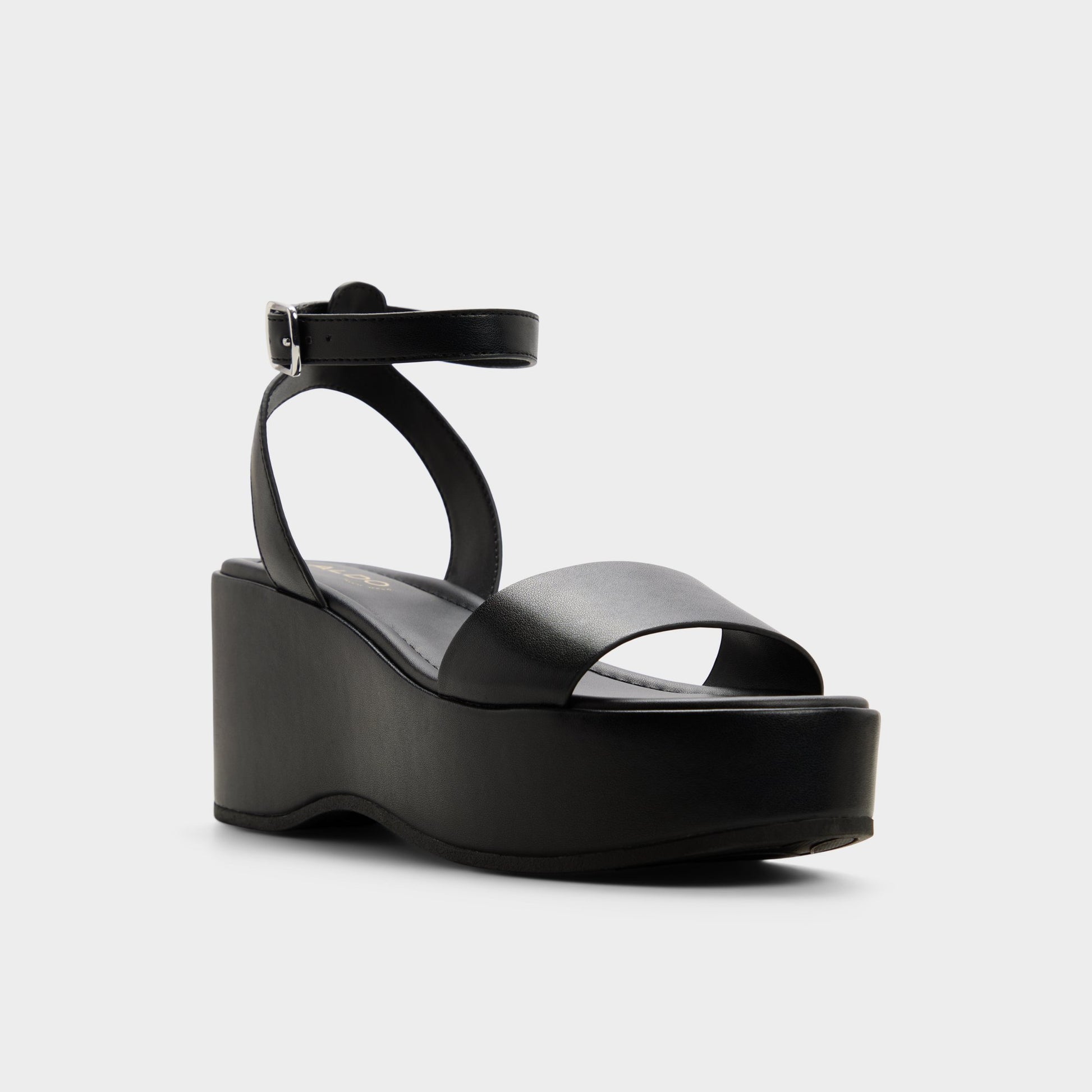 Three-quarter angle of Black Oneiwin Wedge sandal's front side