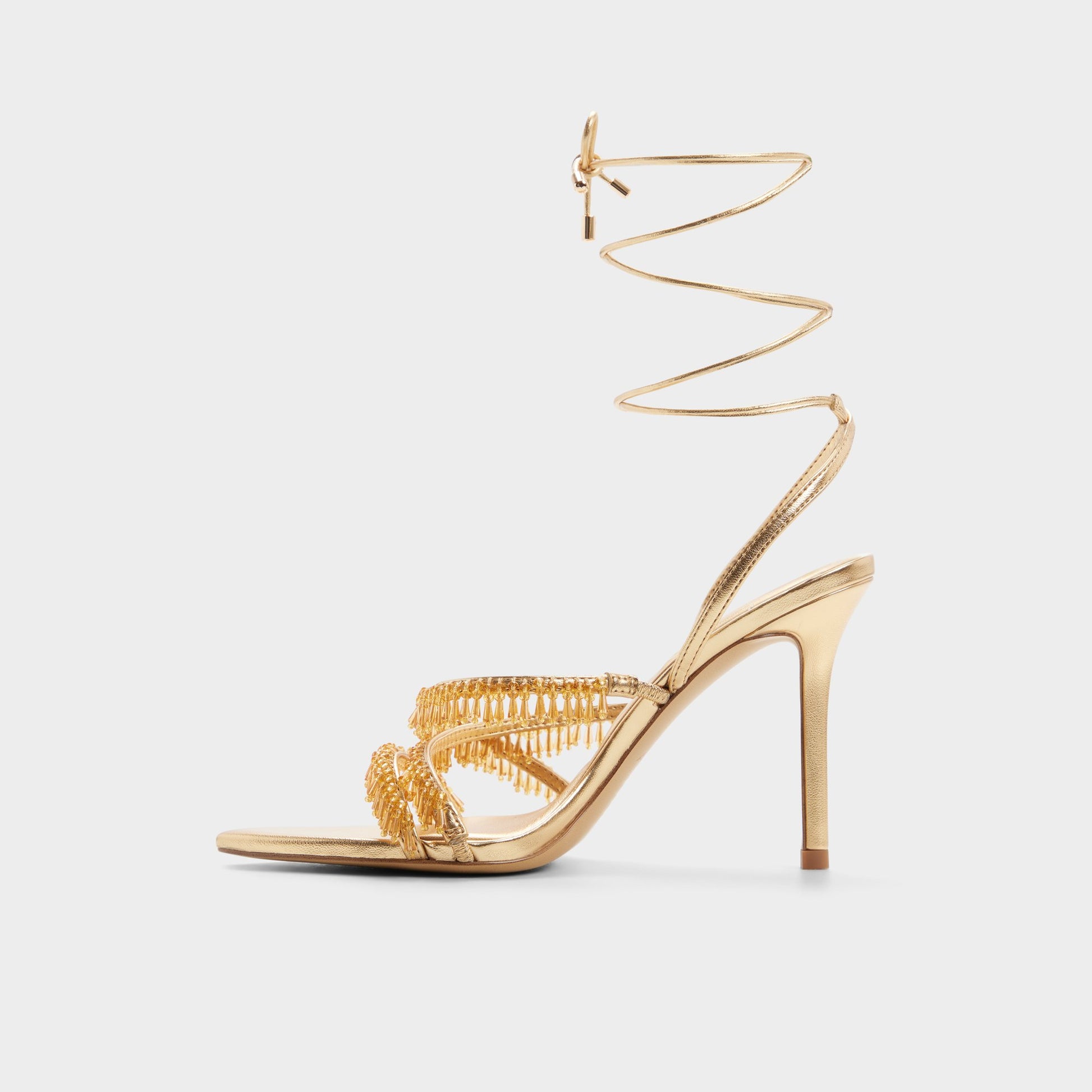 Side view of Gold Flaming Strappy heeled sandal