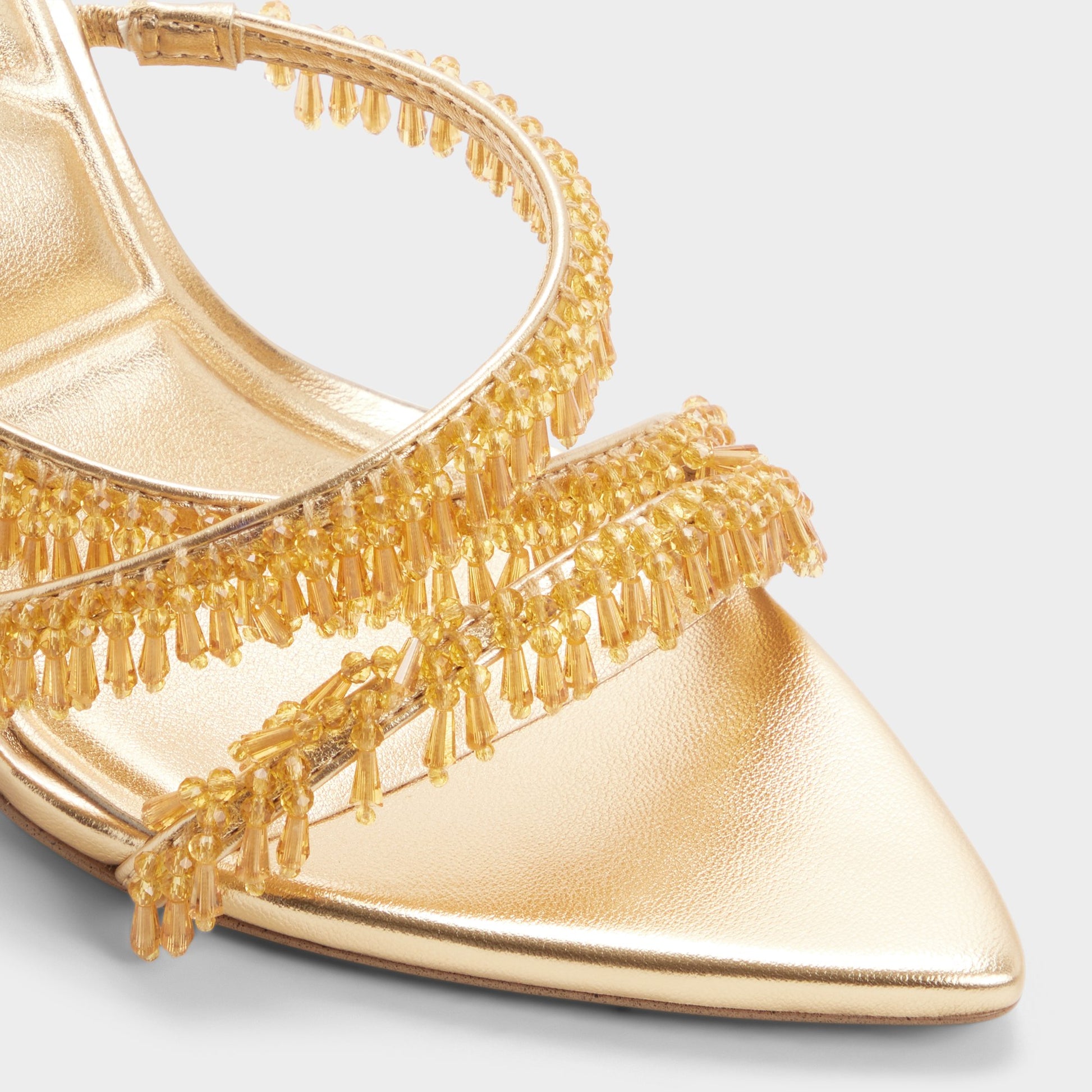 Close-up of the Gold Flaming Strappy heeled sandal