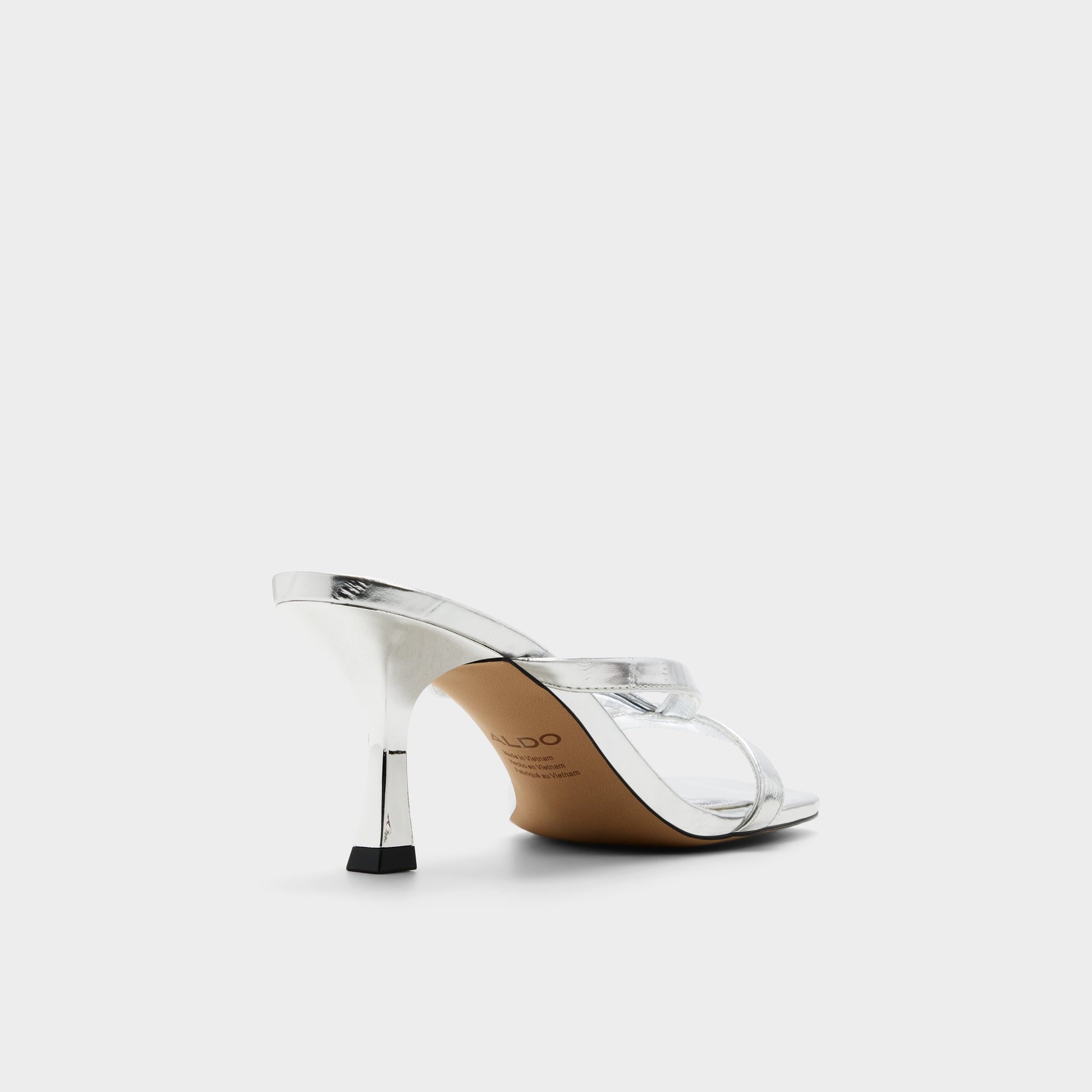 Three-quarter angle of Silver Enalen Heeled mule's back side