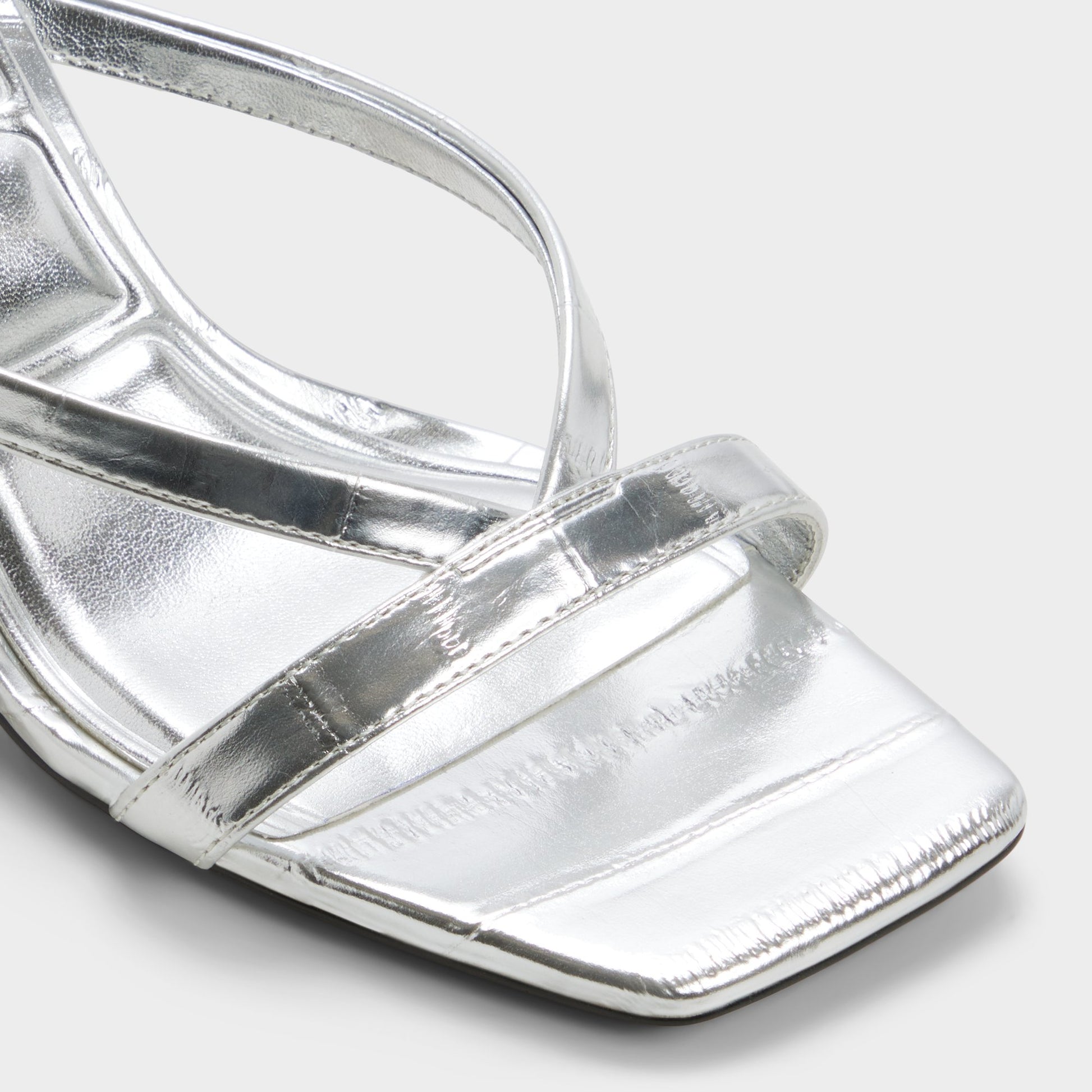 Close-up of the Silver Enalen Heeled mule