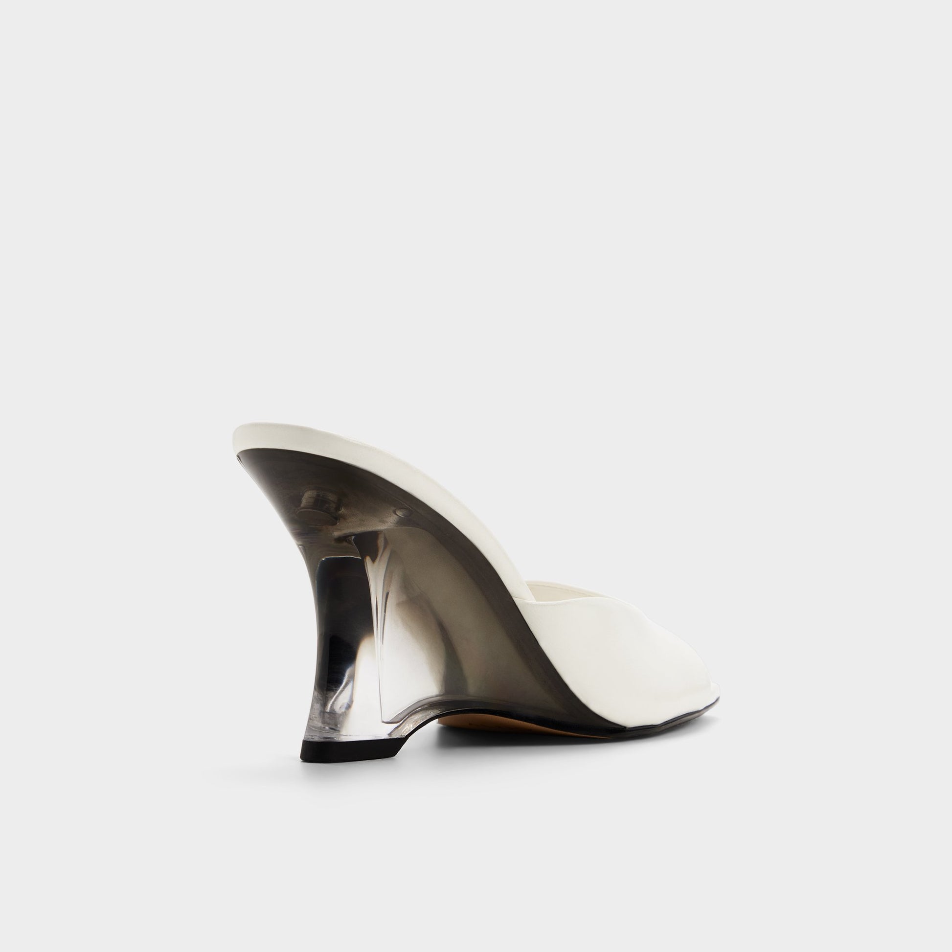 Three-quarter angle of White/bone Luminae Wedge sandal's back side