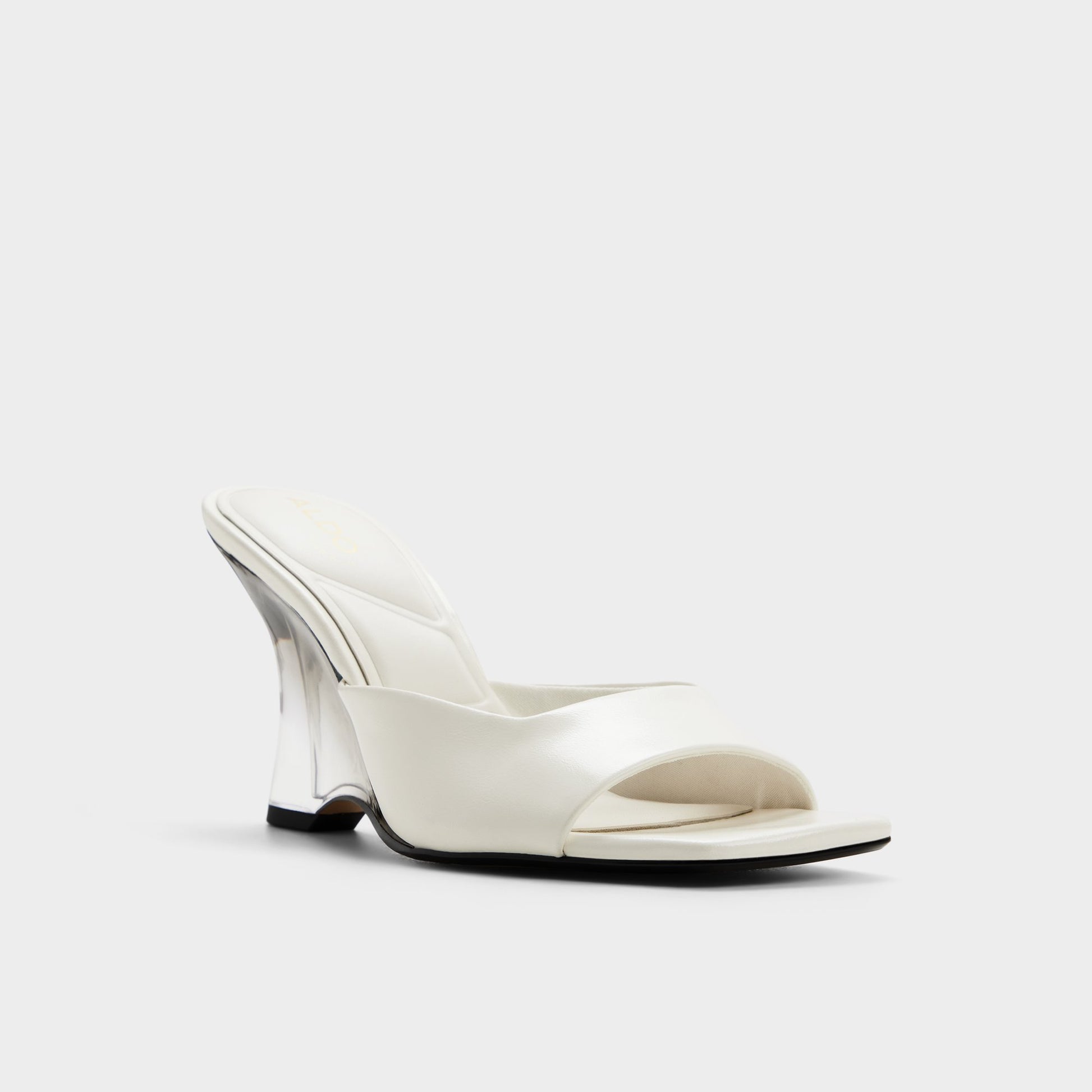 Three-quarter angle of White/bone Luminae Wedge sandal's front side