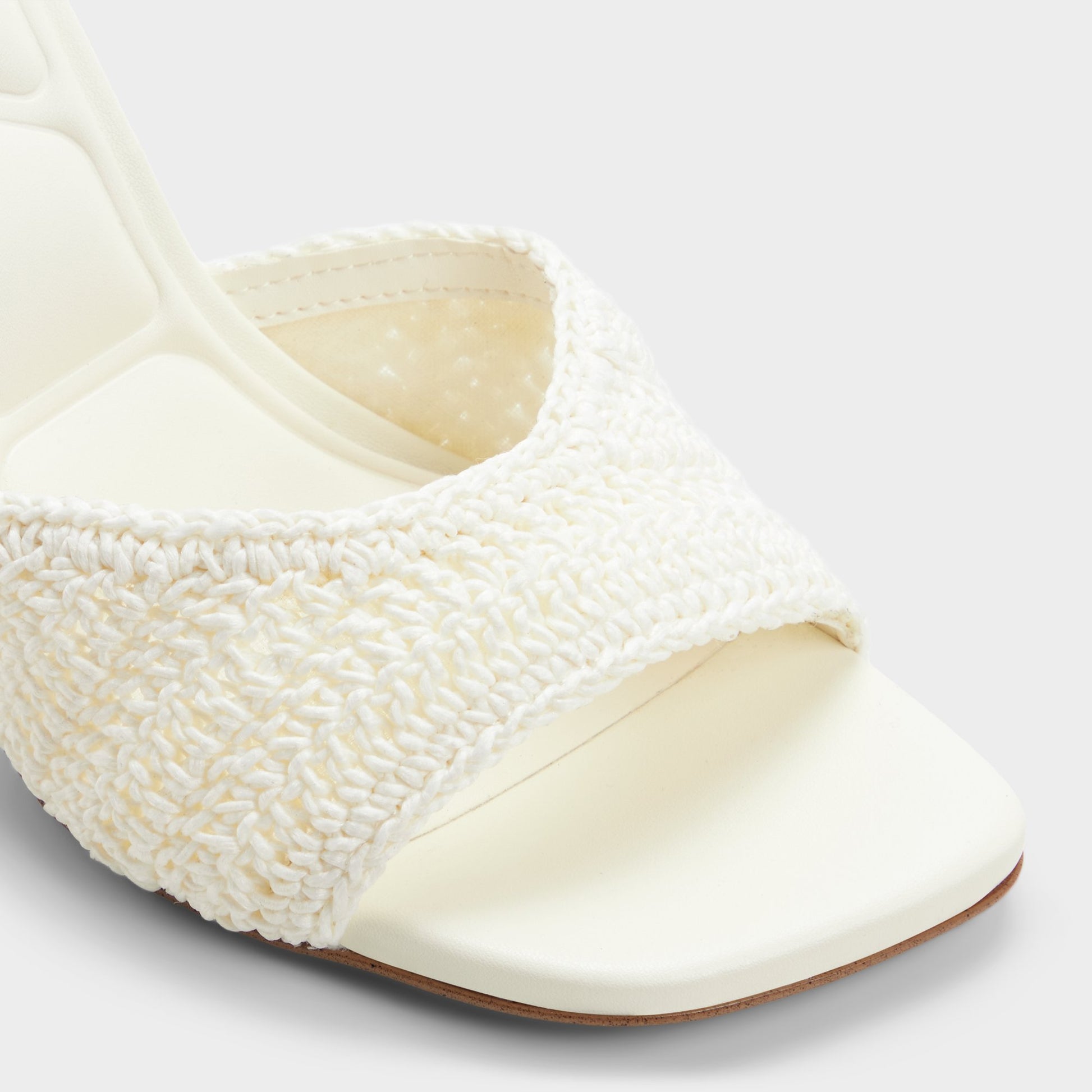 Close-up of the White/bone Evadalie Heeled mule