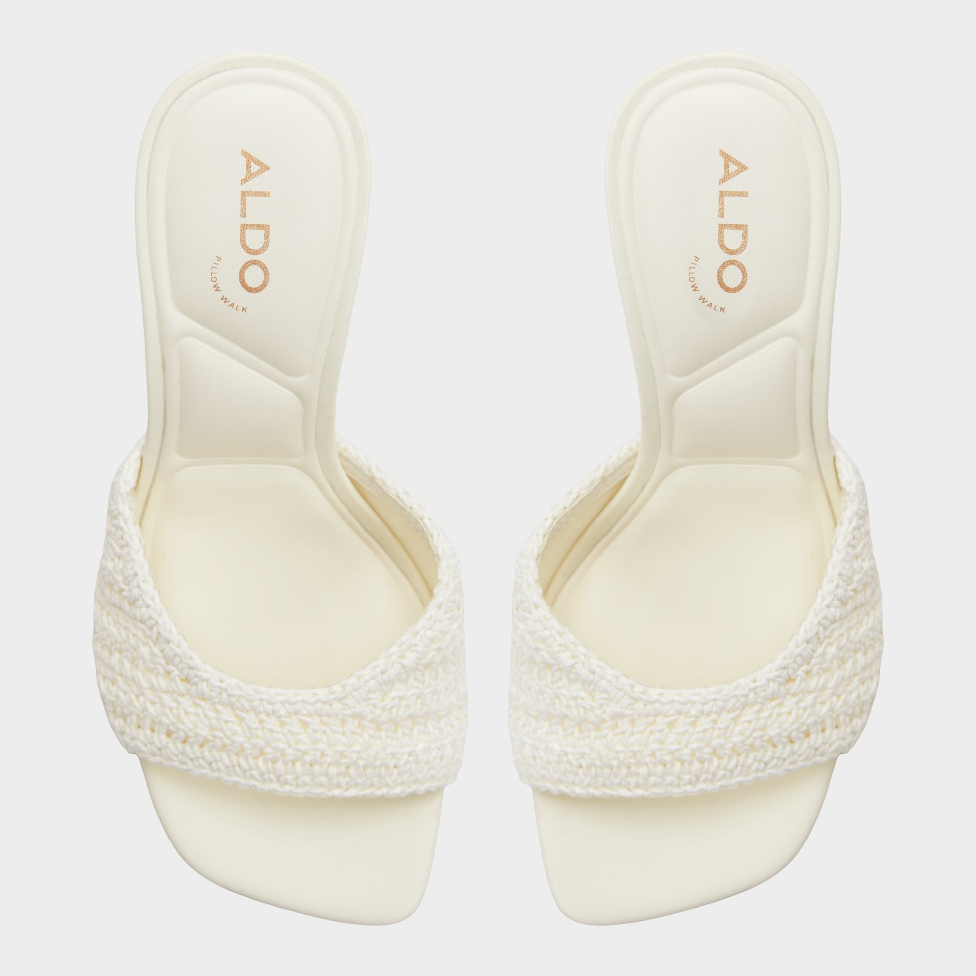 Top-down view of the White/bone Evadalie Heeled mule