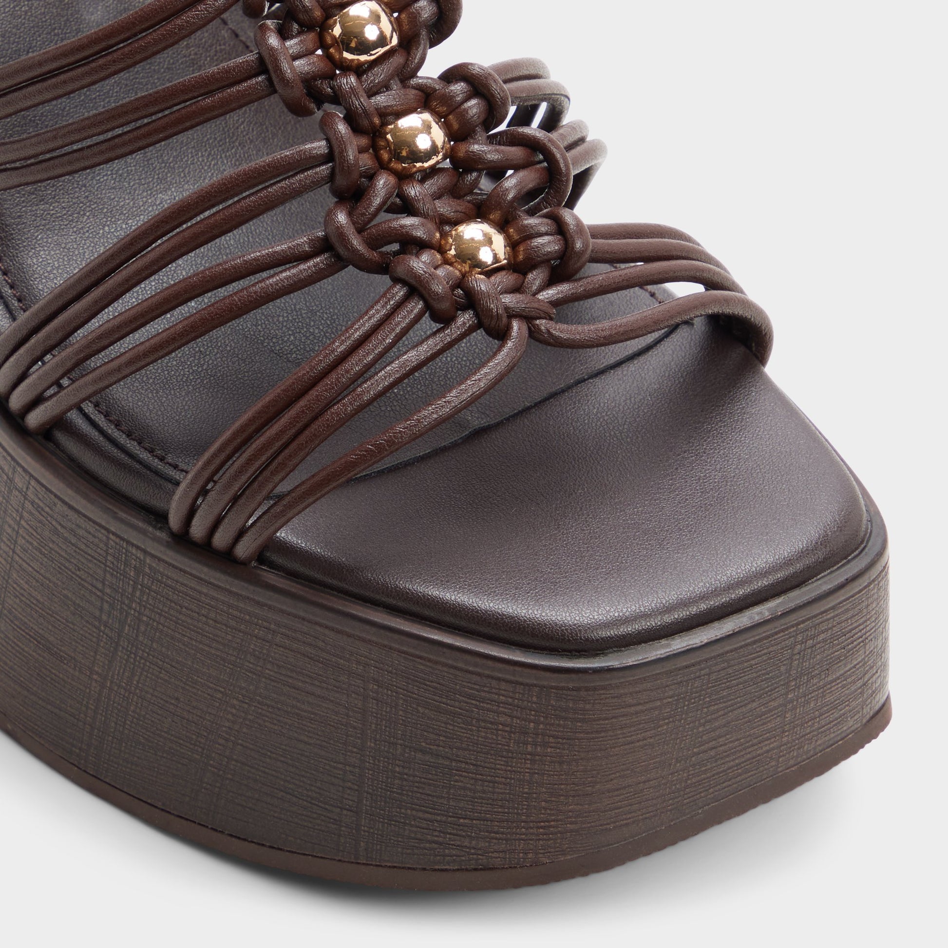 Close-up of the Dark brown Timber Strappy wedge sandal