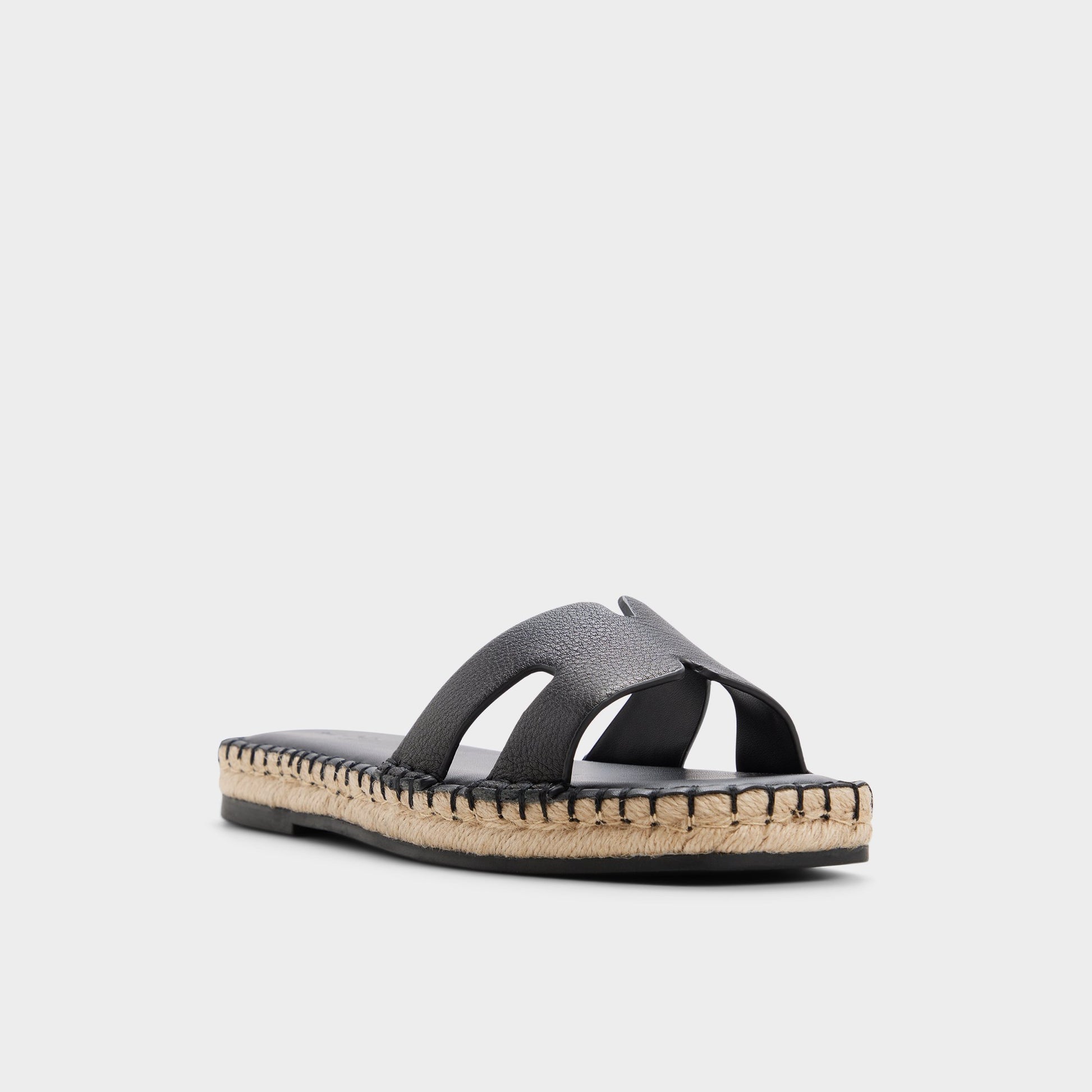 Three-quarter angle of Other black Itspadrille Slide sandal's front side