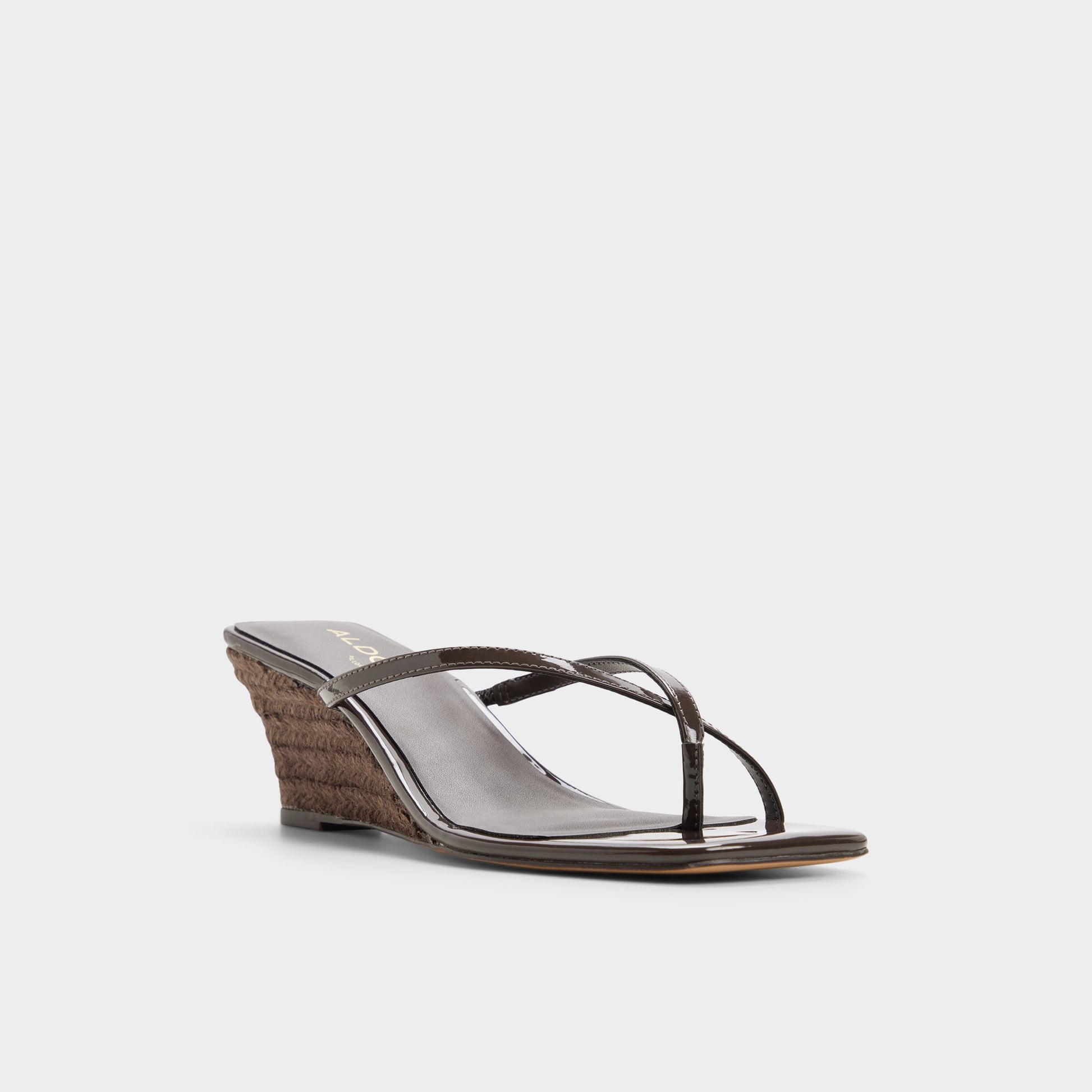 Three-quarter angle of Dark brown Nadiana Wedge sandal's front side