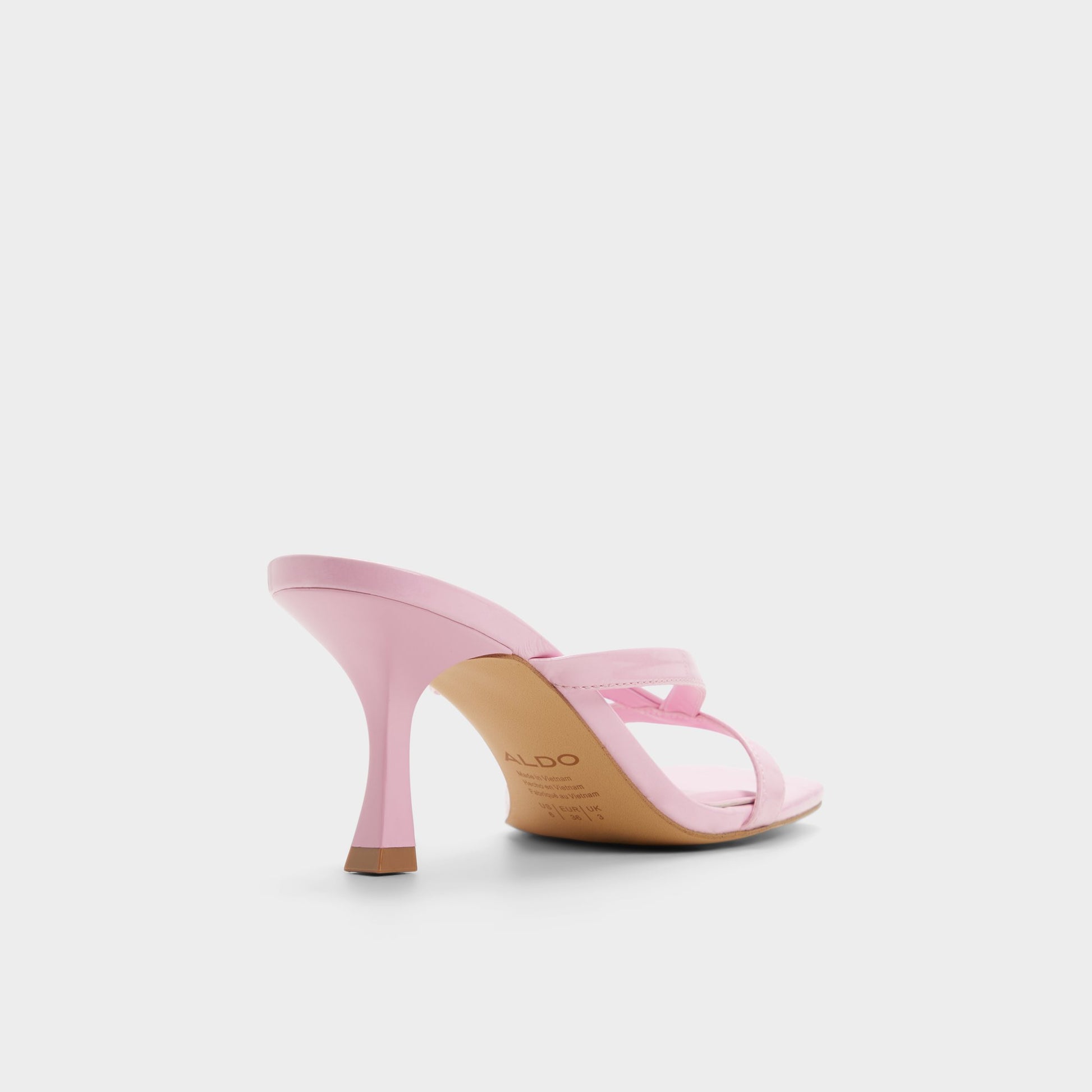 Three-quarter angle of Medium pink Enalen Heeled mule's back side
