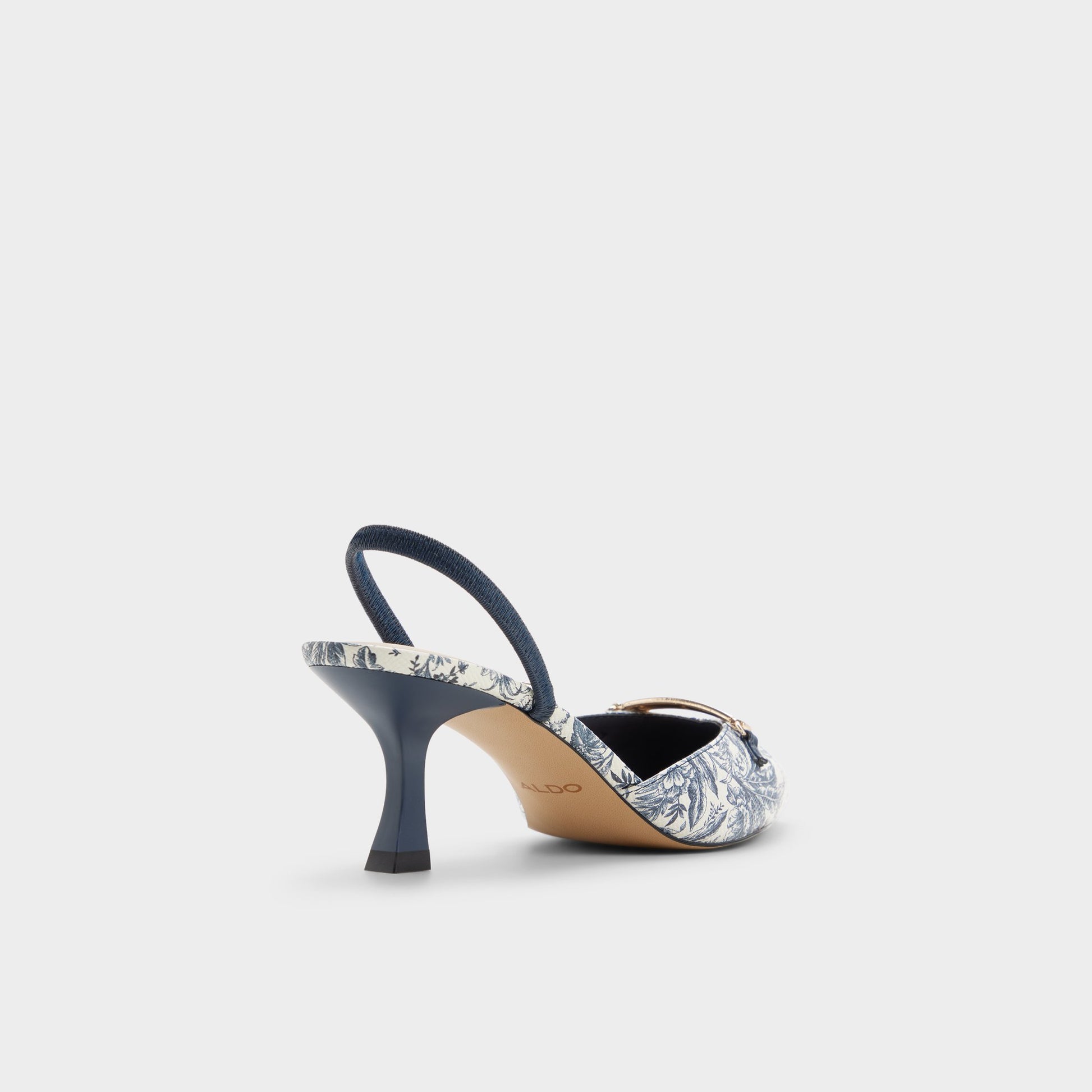 Three-quarter angle of White/blue Nailah Slingback heel's back side