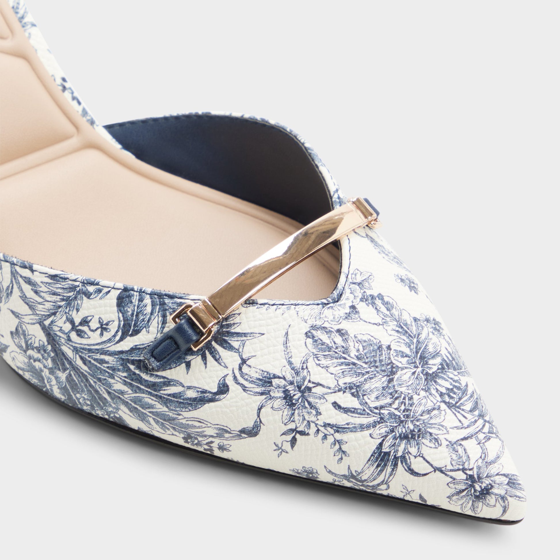 Close-up of the White/blue Nailah Slingback heel