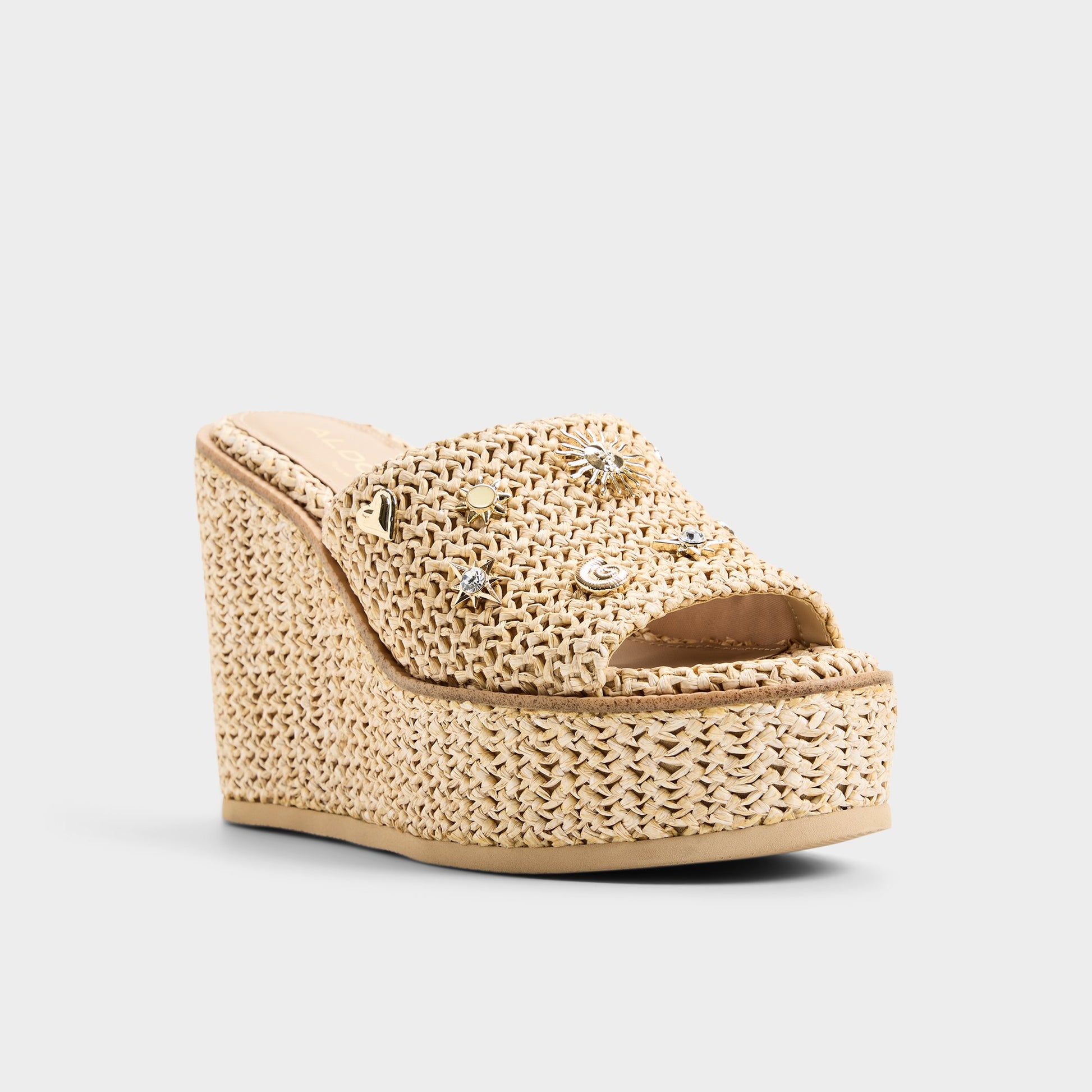 Three-quarter angle of Natural Midsommar Wedge sandal's front side