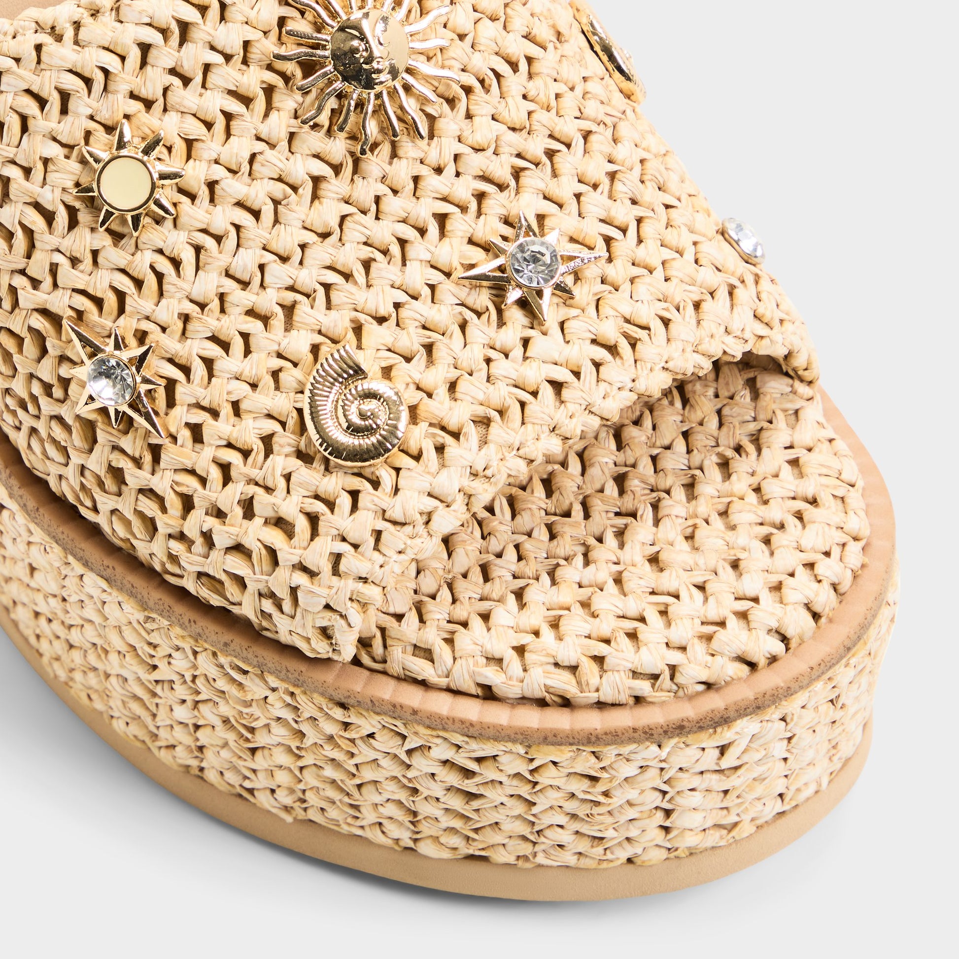 Close-up of the Natural Midsommar Wedge sandal