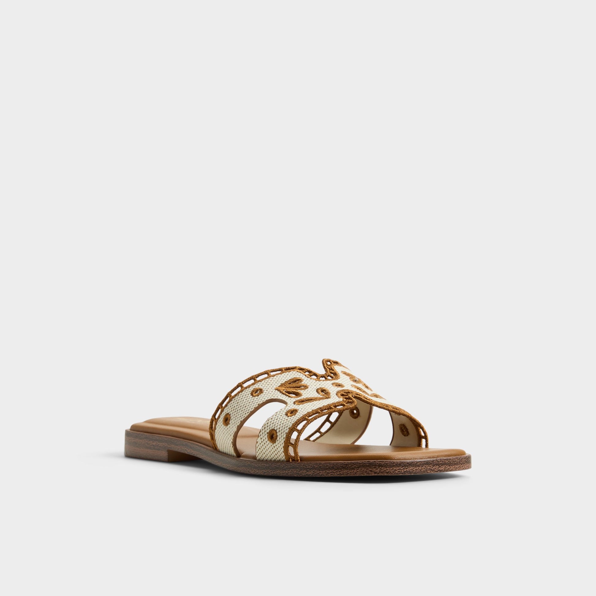 Three-quarter angle of Natural Itsandal Slide sandal's front side